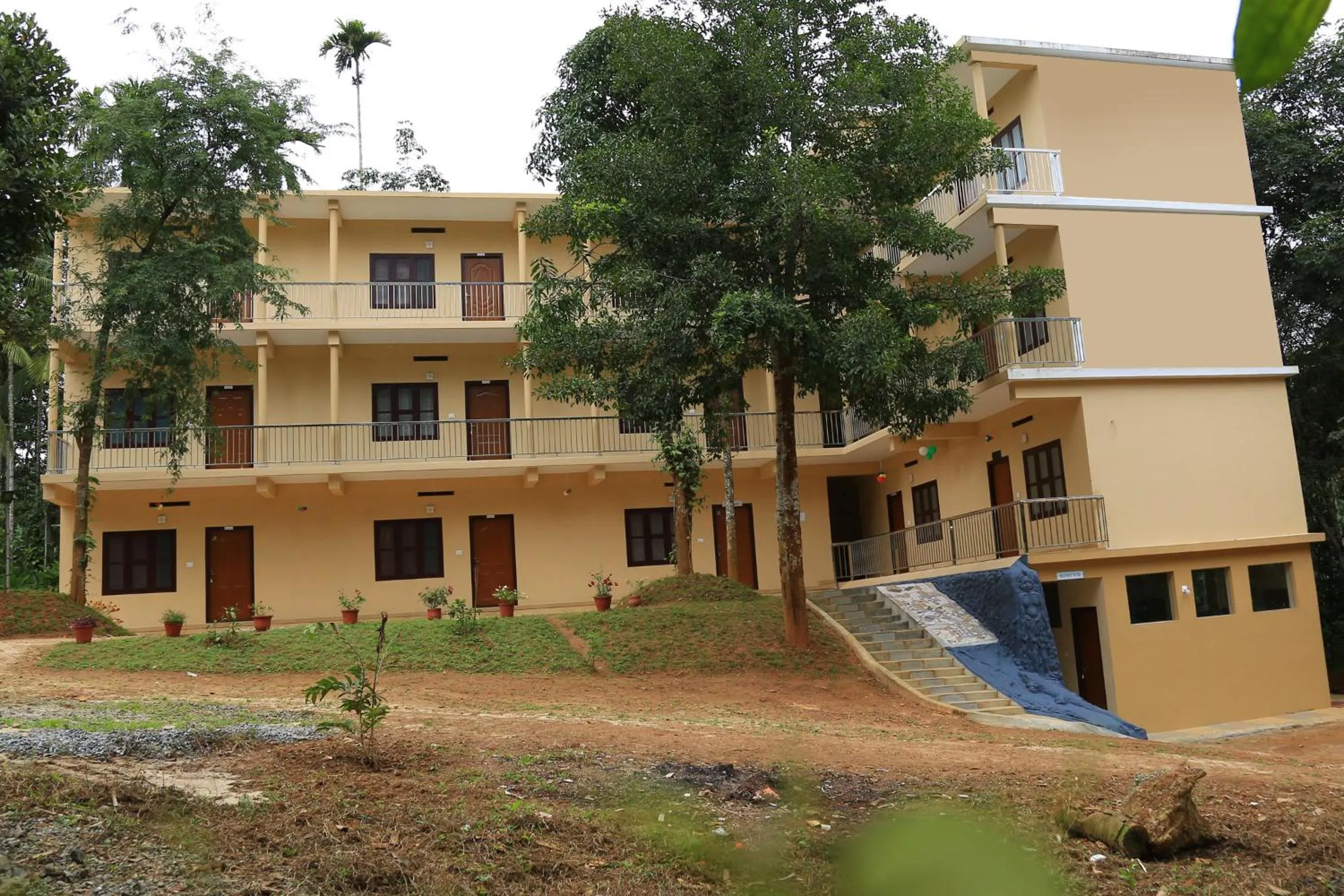 Property building in Gooseberry Family Retreats - Wayanad by KARAPUZHA RESORTS