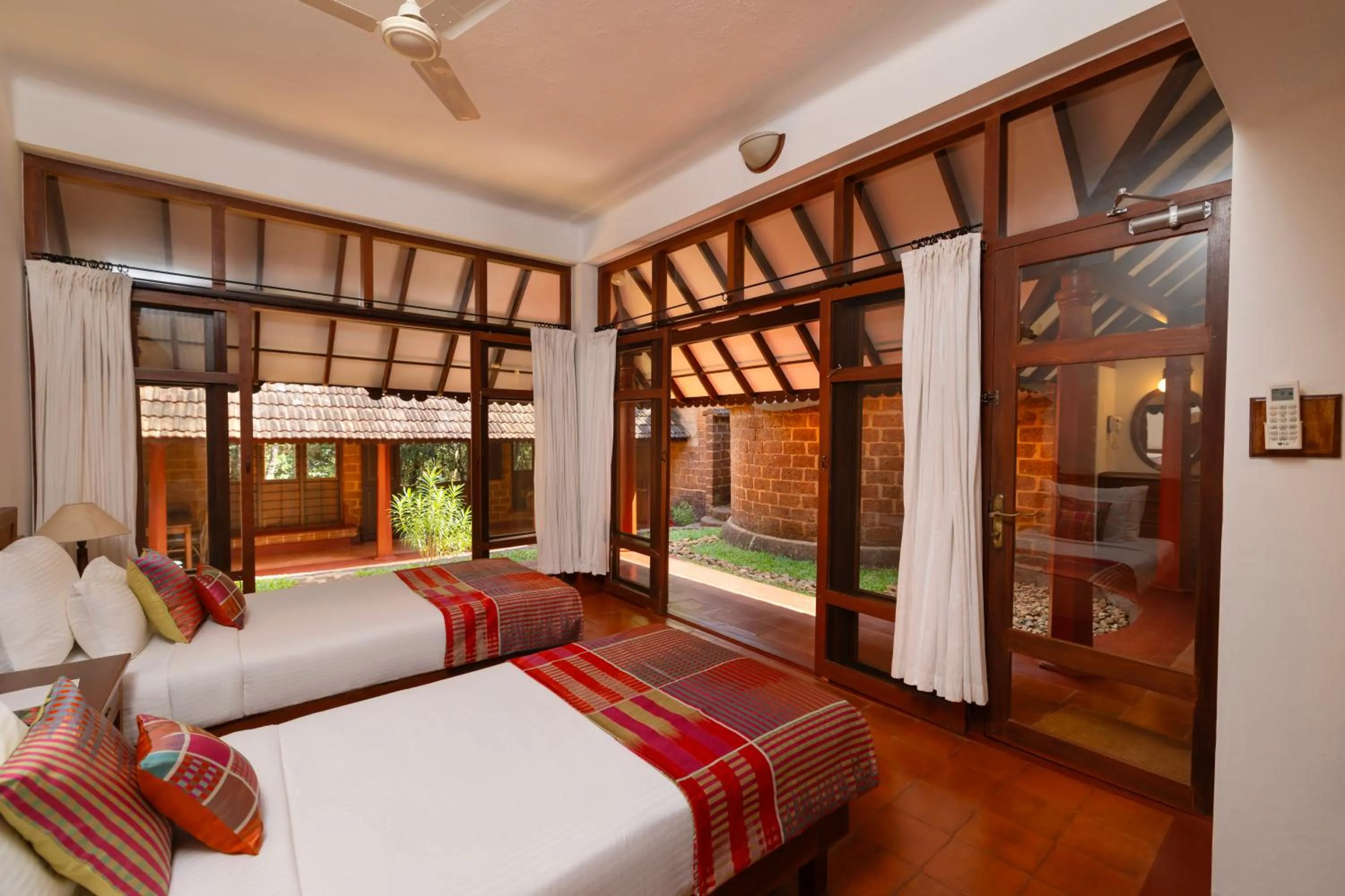 Bed in SwaSwara Wellness - A CGH Earth Experience, Gokarna