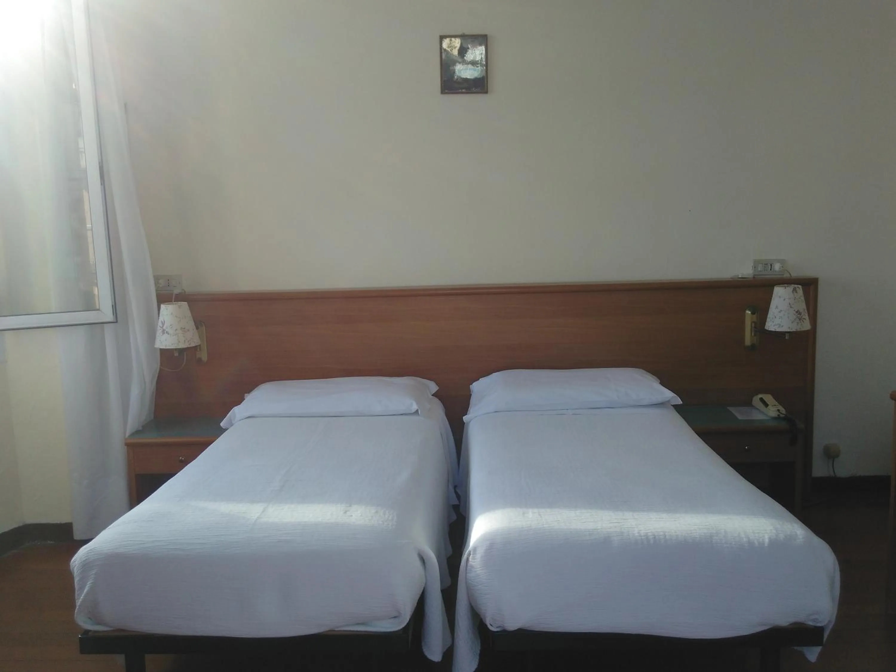 Photo of the whole room, Bed in Albergo Bandoni