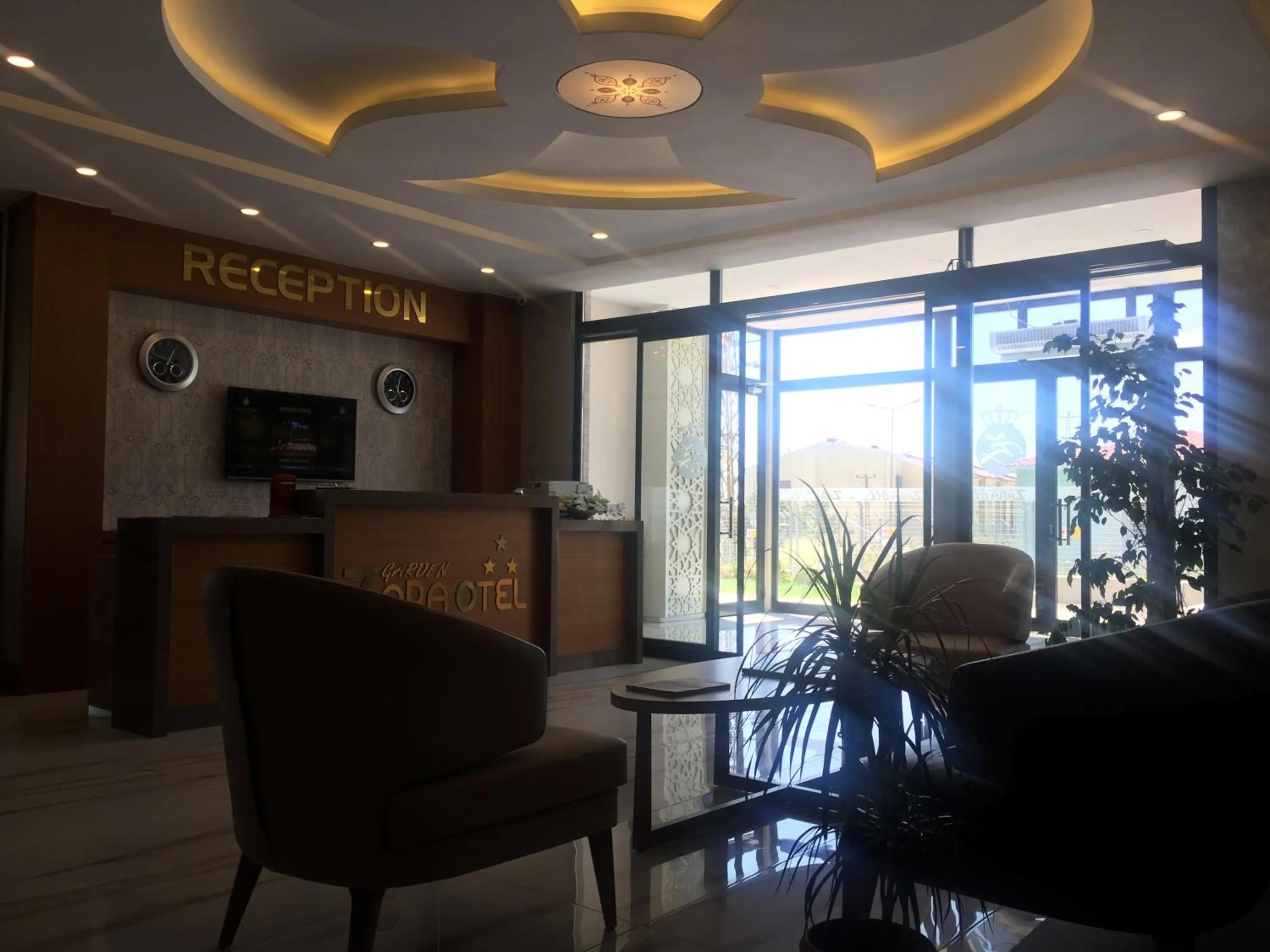 Lobby or reception in Garden Zara Hotel