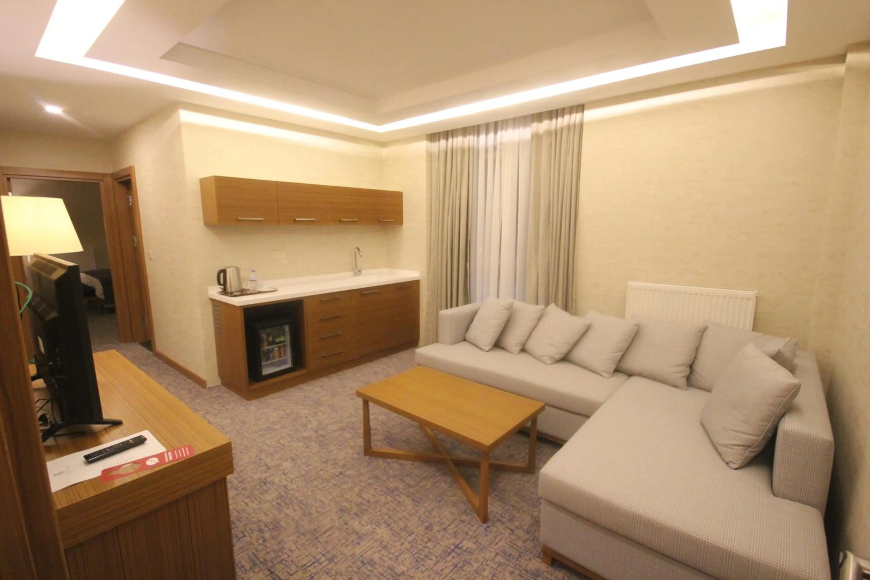 TV and multimedia in Garden Zara Hotel