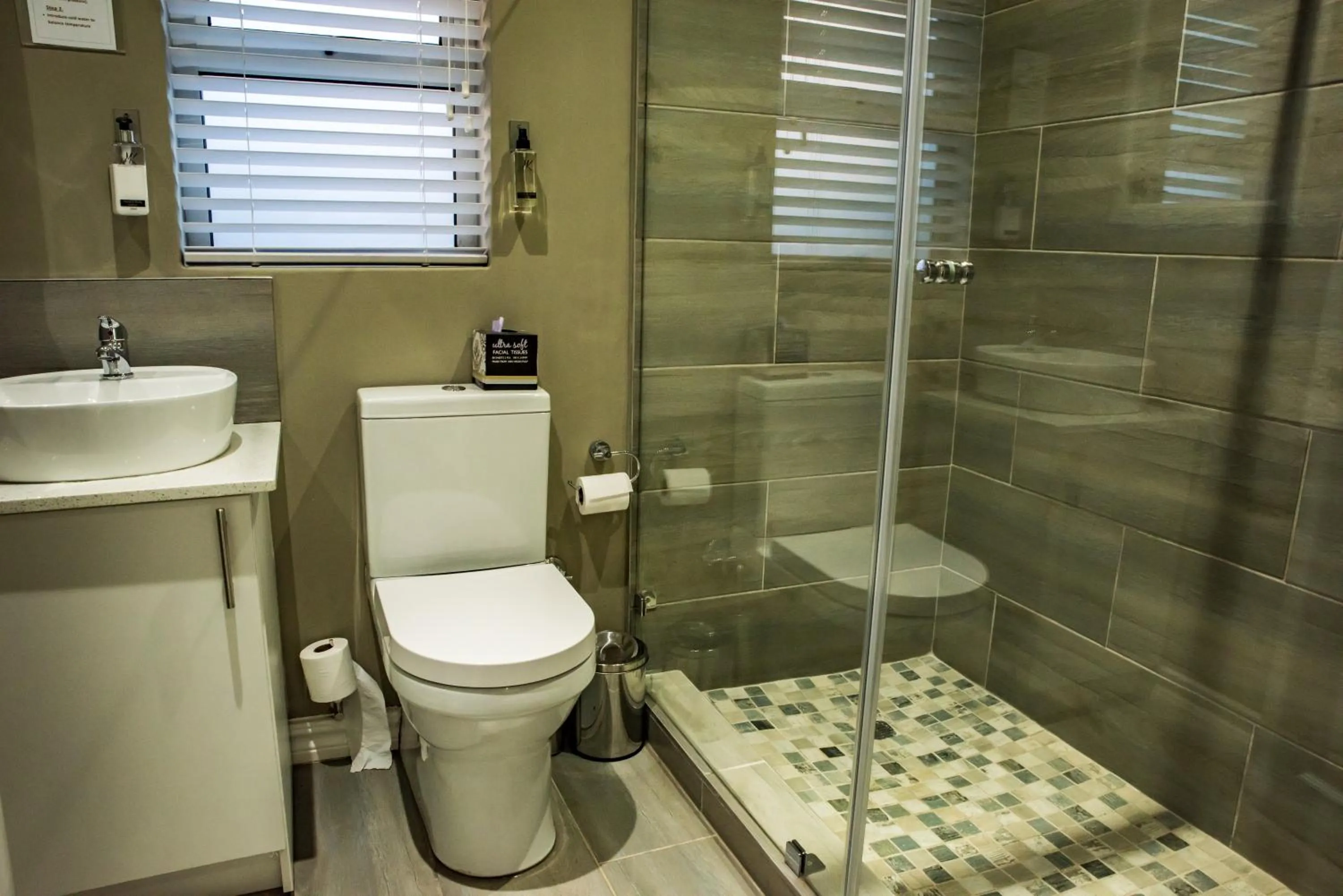 Toilet in Vanilla Guesthouse