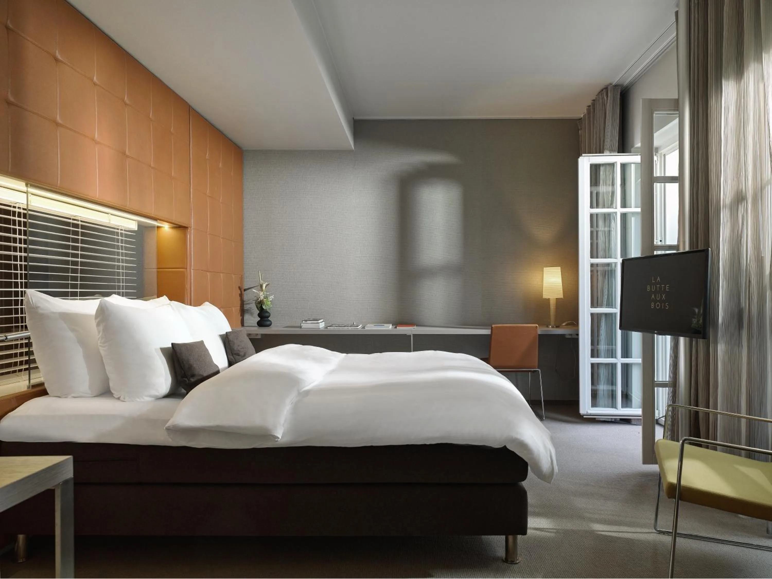 Bed in La Butte aux Bois a Small Luxury Hotel of the World