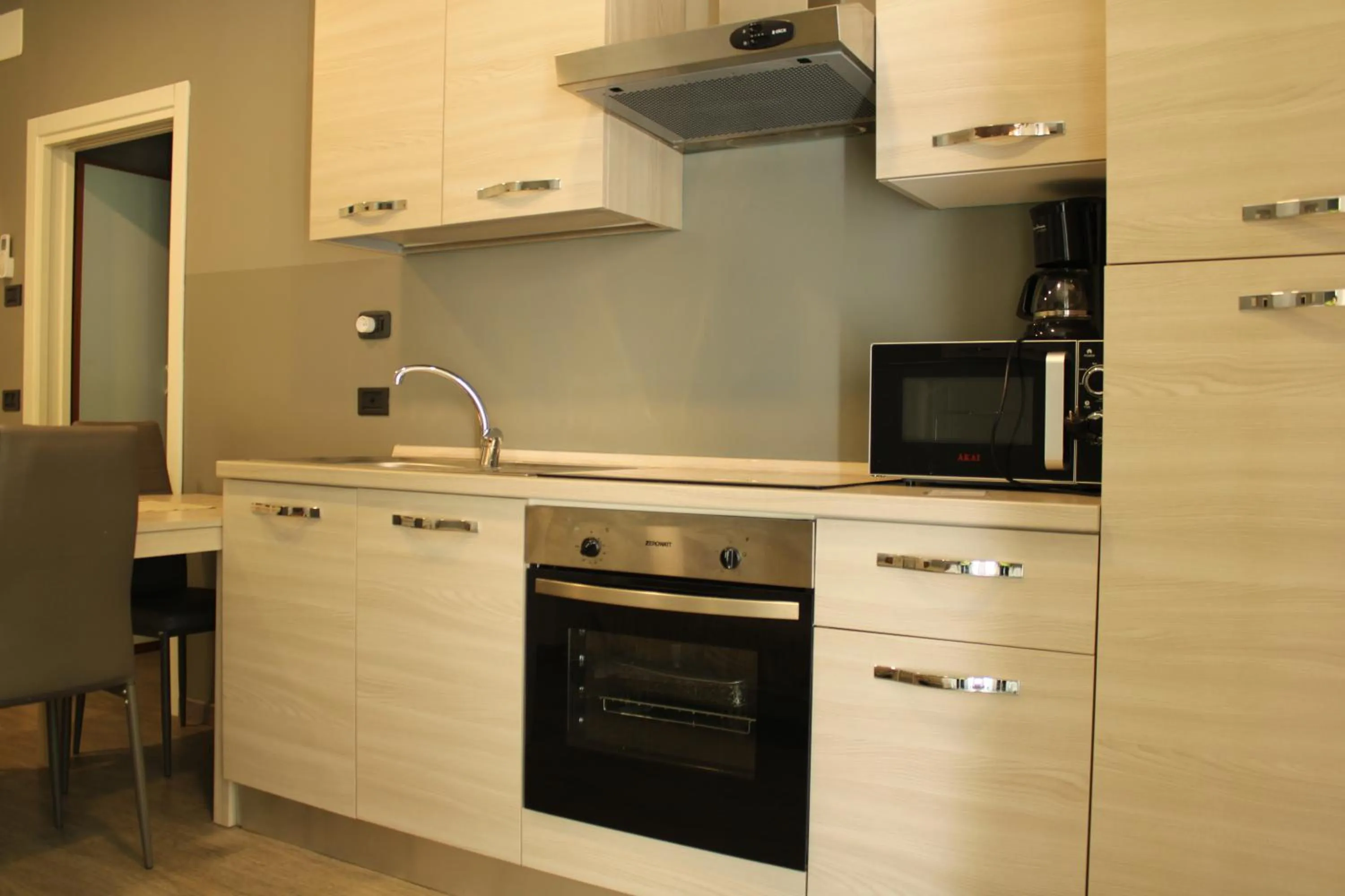 Kitchen or kitchenette in Residence Royal House