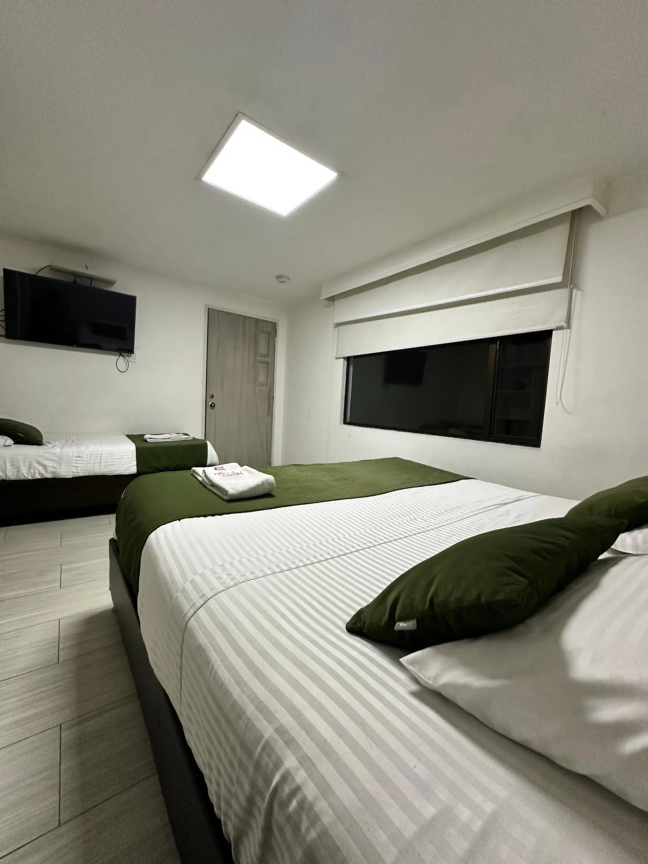 Bed in Hotel Bestmark Platino