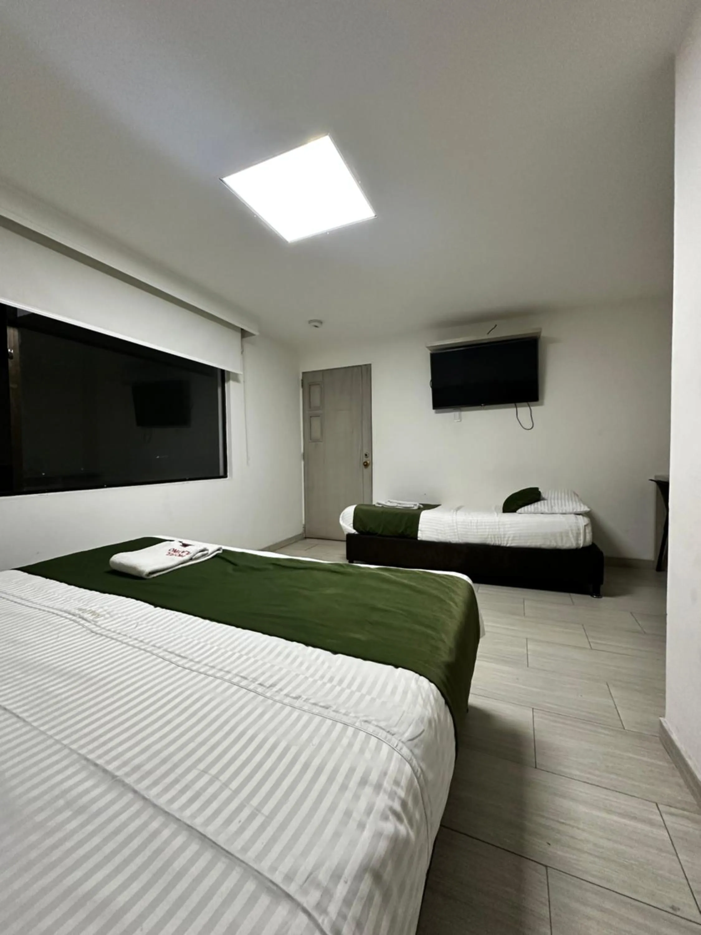 Bed in Hotel Bestmark Platino