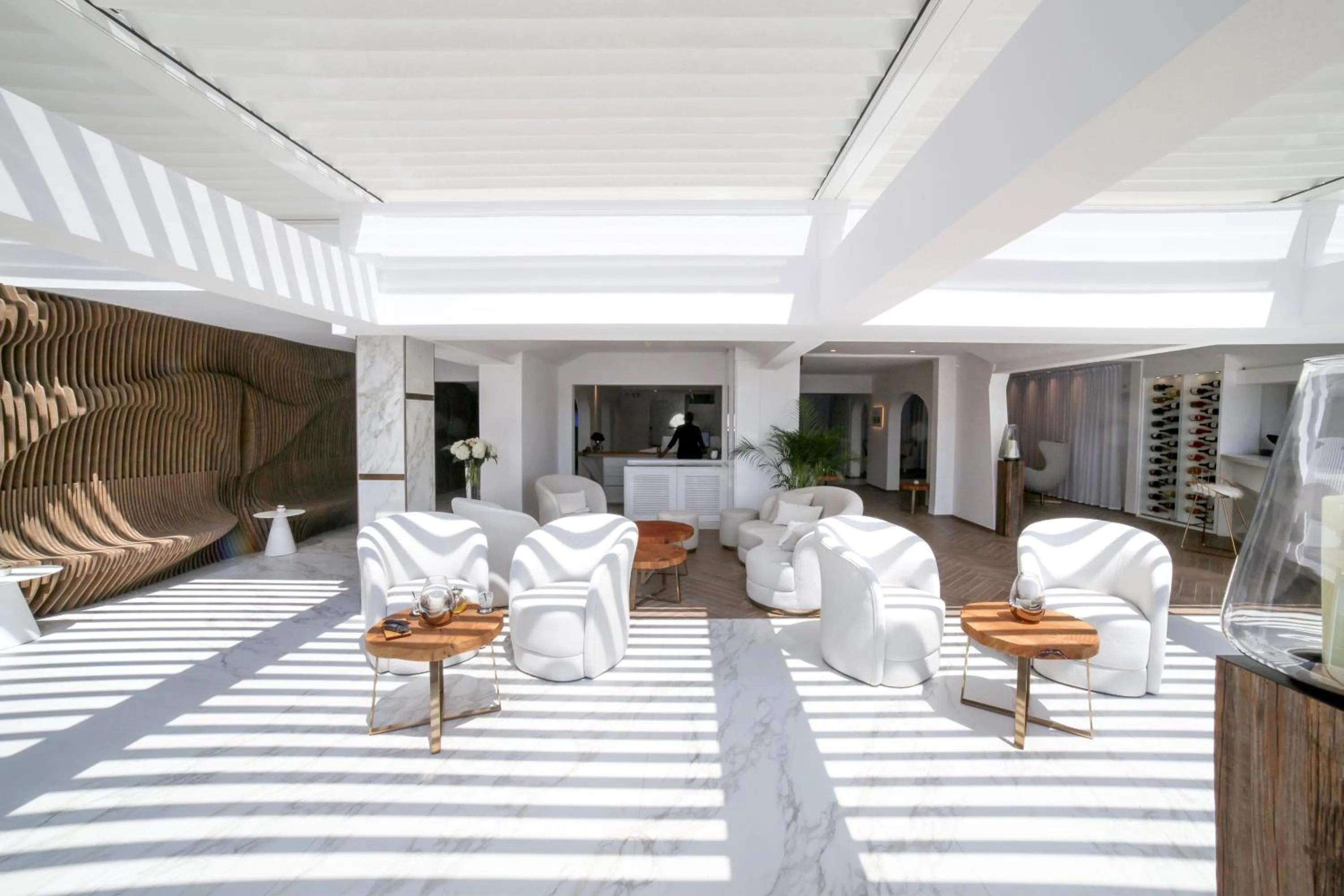 Communal lounge/ TV room in Hôtel Marinca & Spa