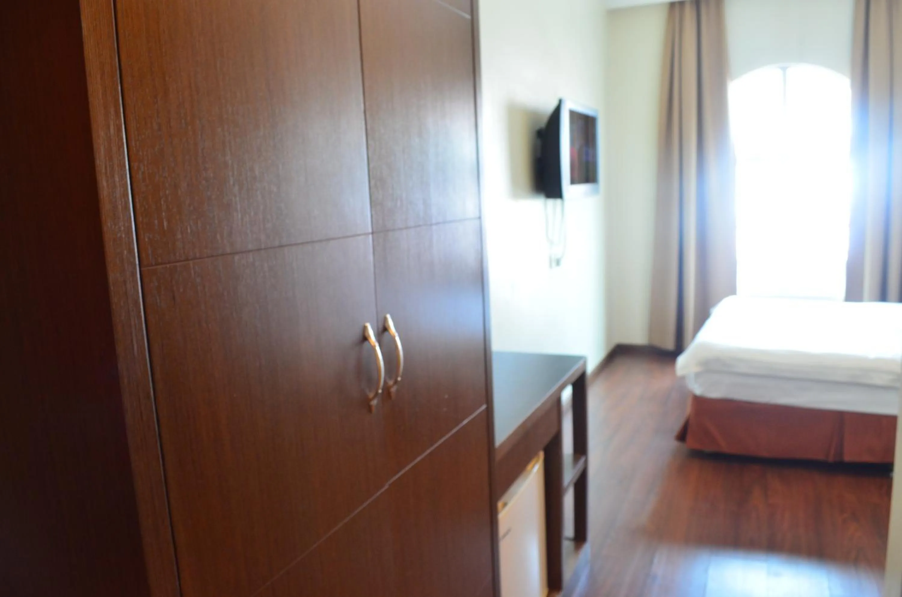 Bed in Lintas Plaza Hotel