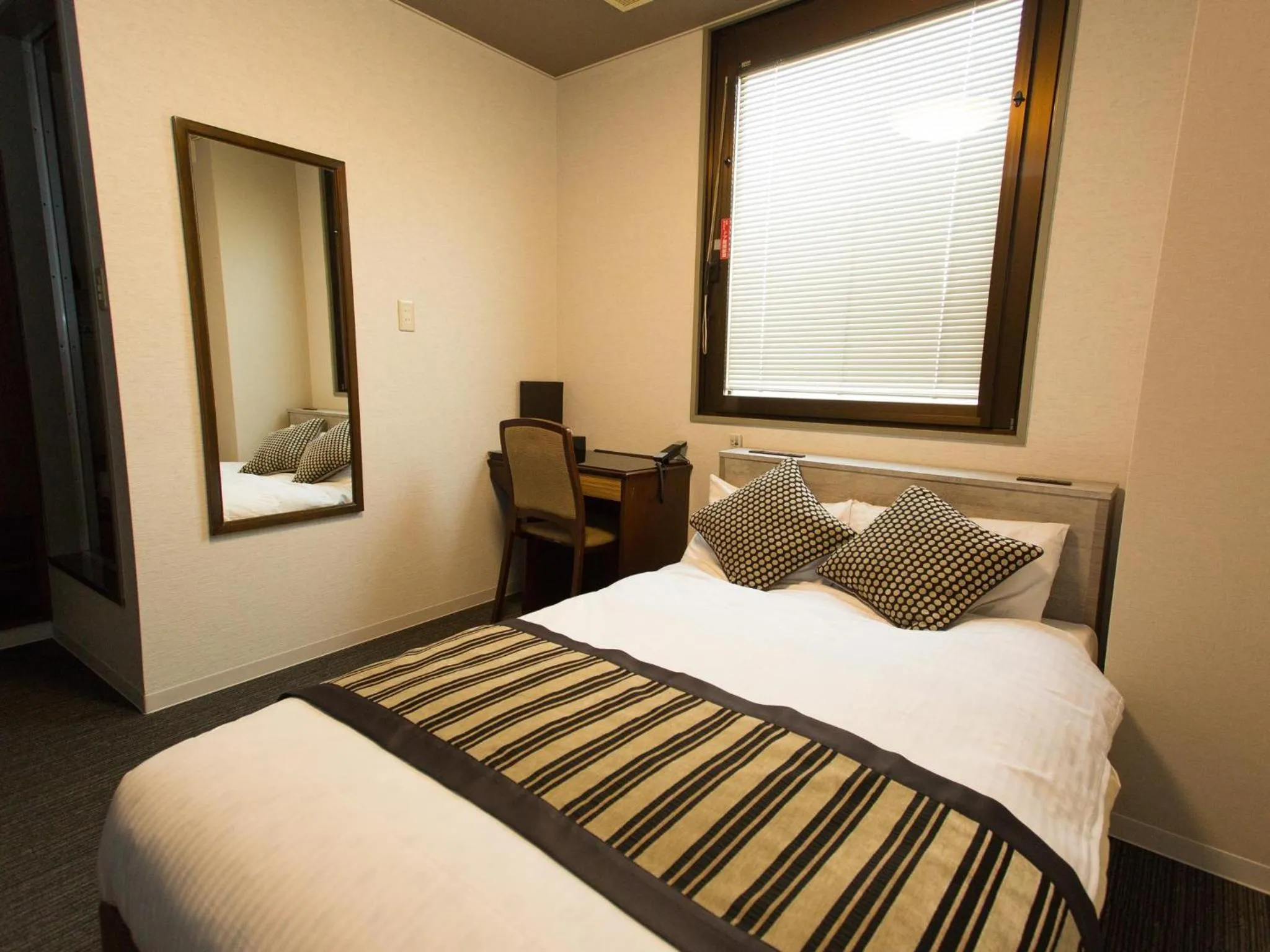 Photo of the whole room, Bed in Hotel AreaOne Nobeoka