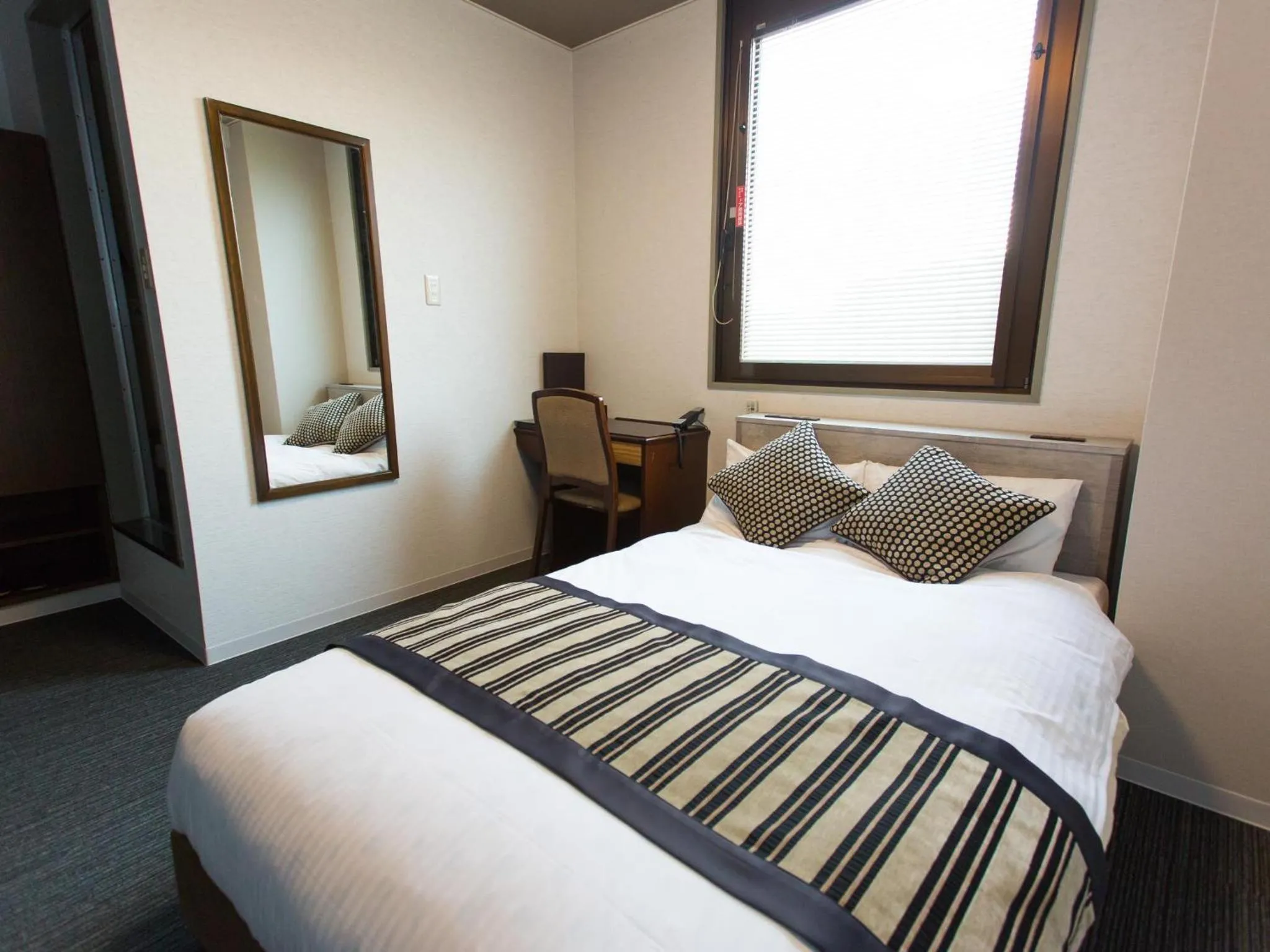 Photo of the whole room, Bed in Hotel AreaOne Nobeoka