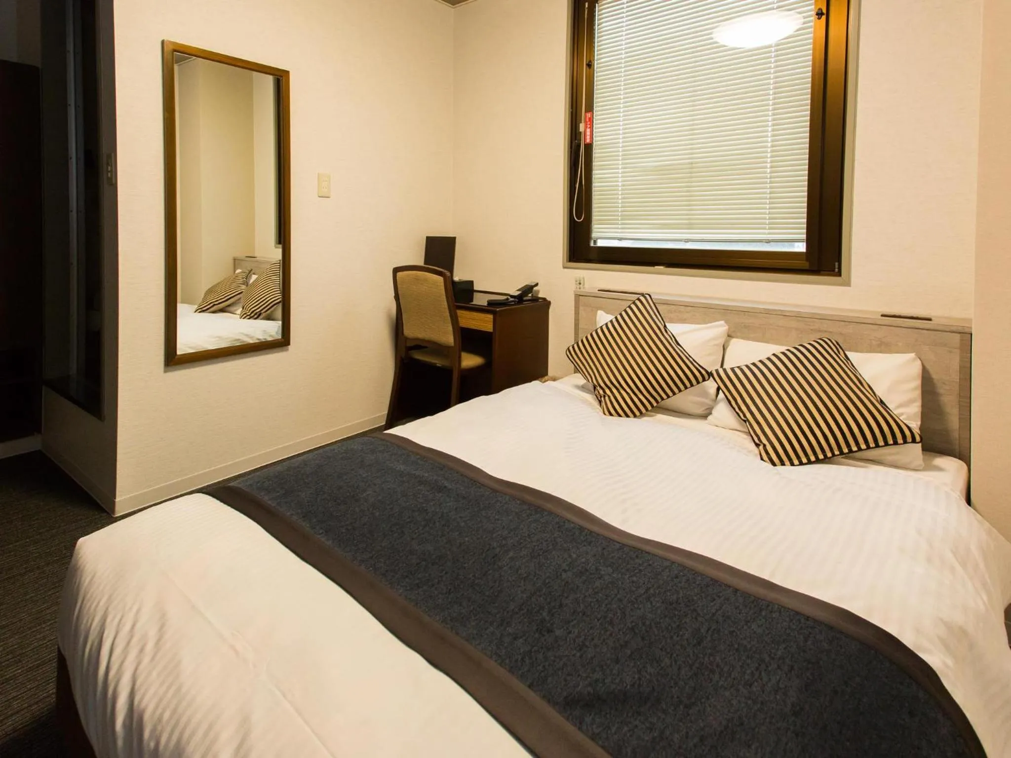 Photo of the whole room, Bed in Hotel AreaOne Nobeoka