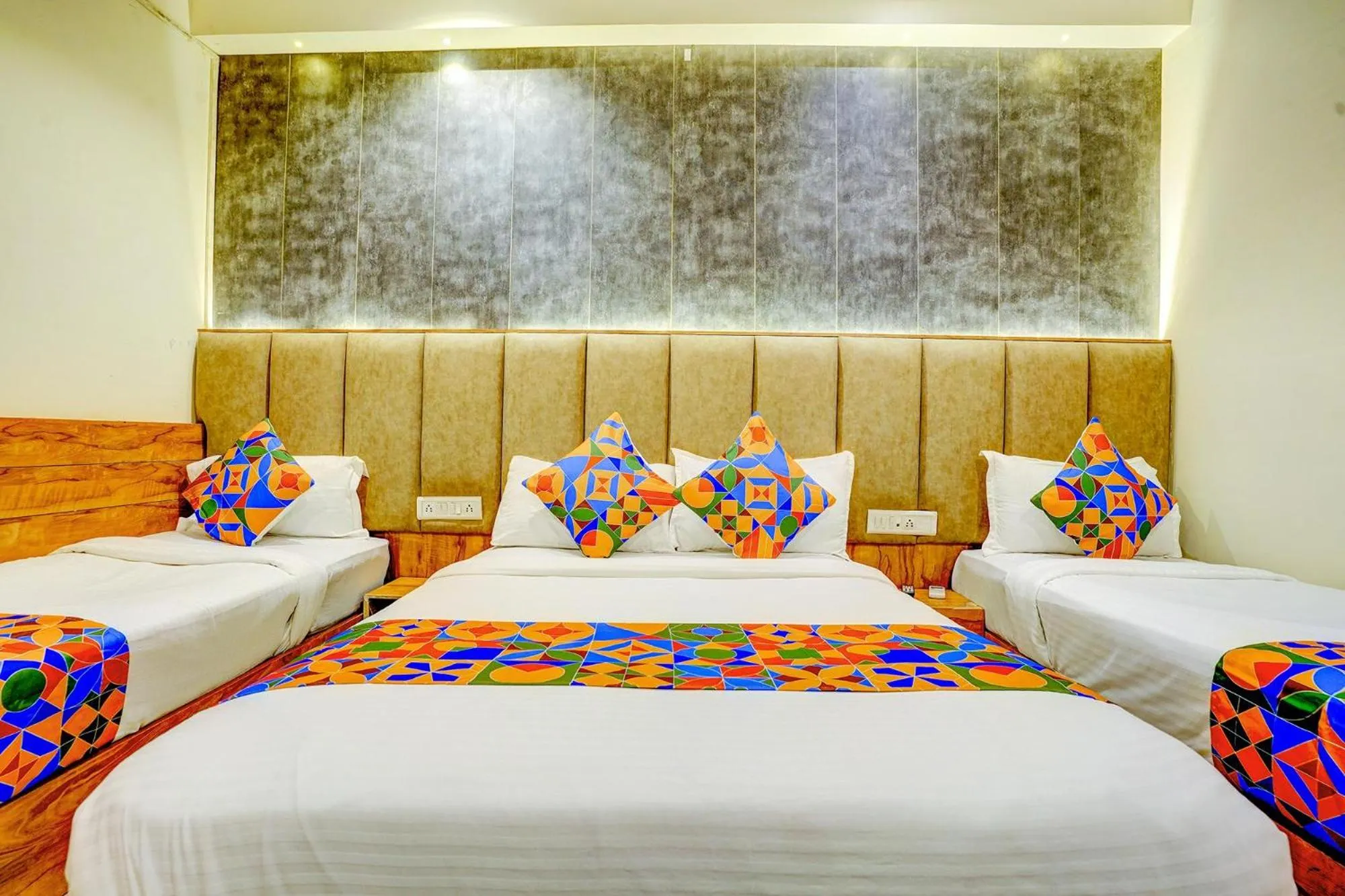 Bed in FabHotel Indore Palace