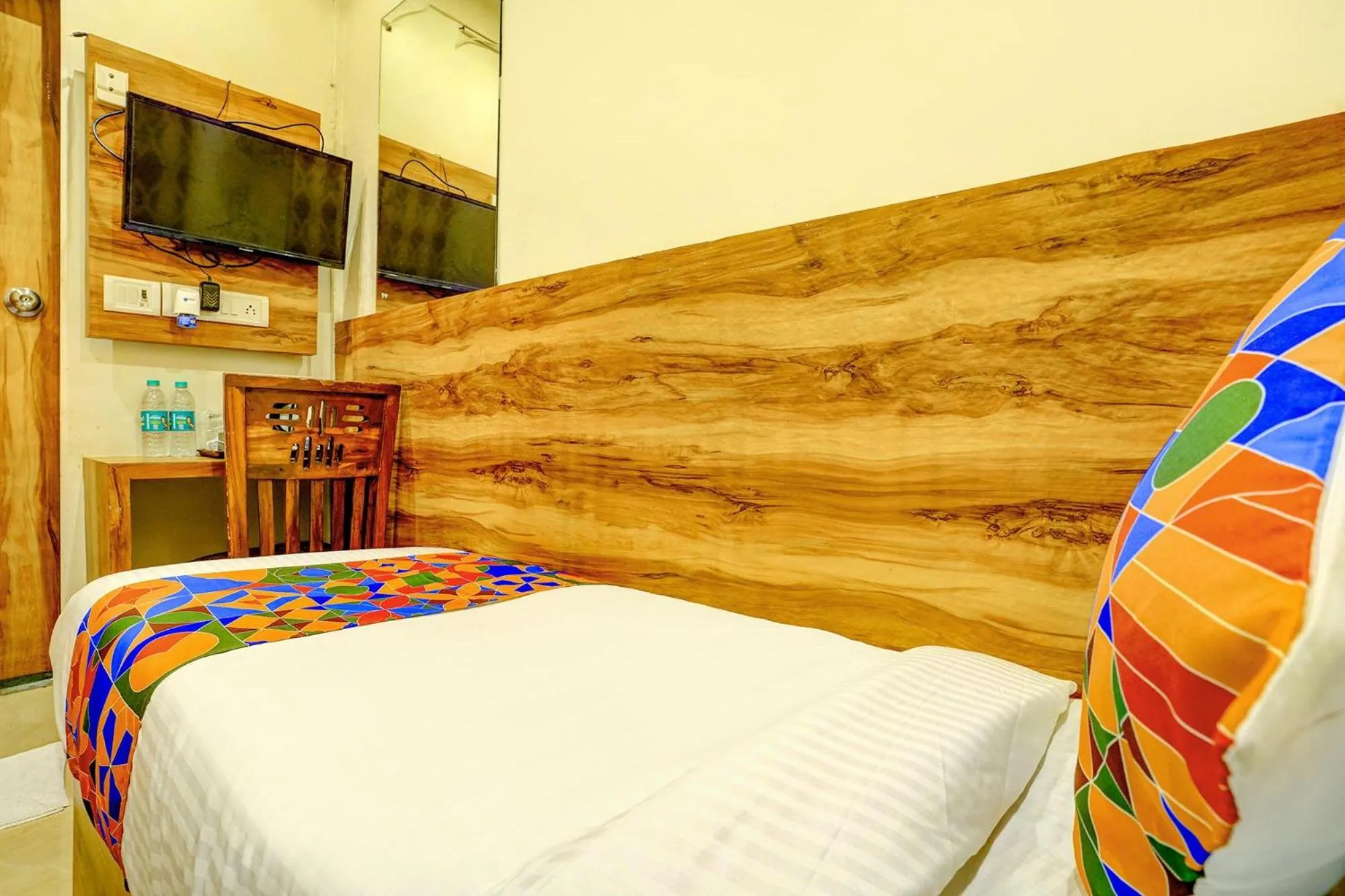 Bed in FabHotel Indore Palace