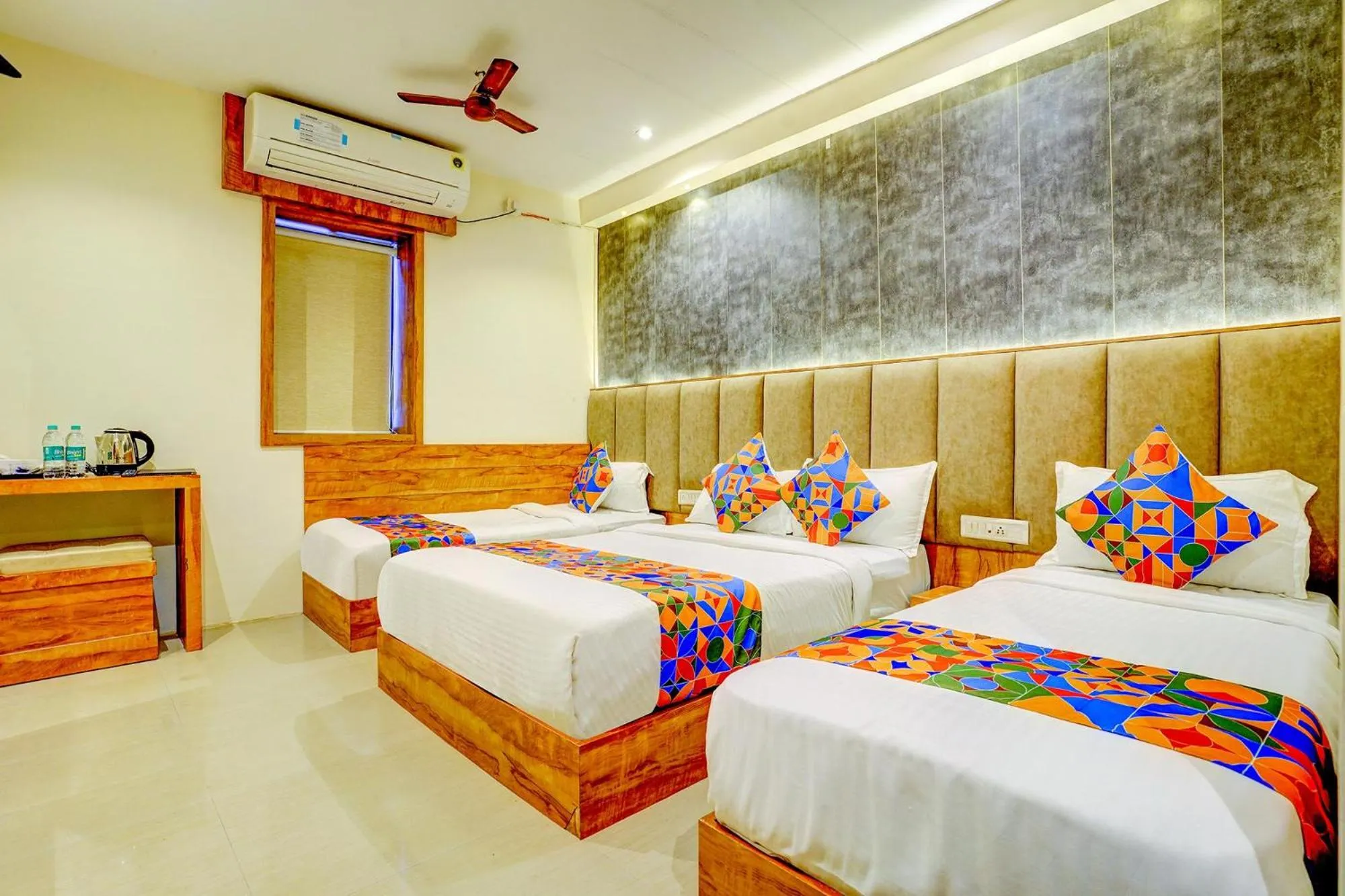 Bed in FabHotel Indore Palace