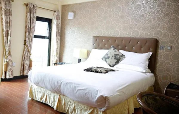 Bed in Afropolitan Hotel