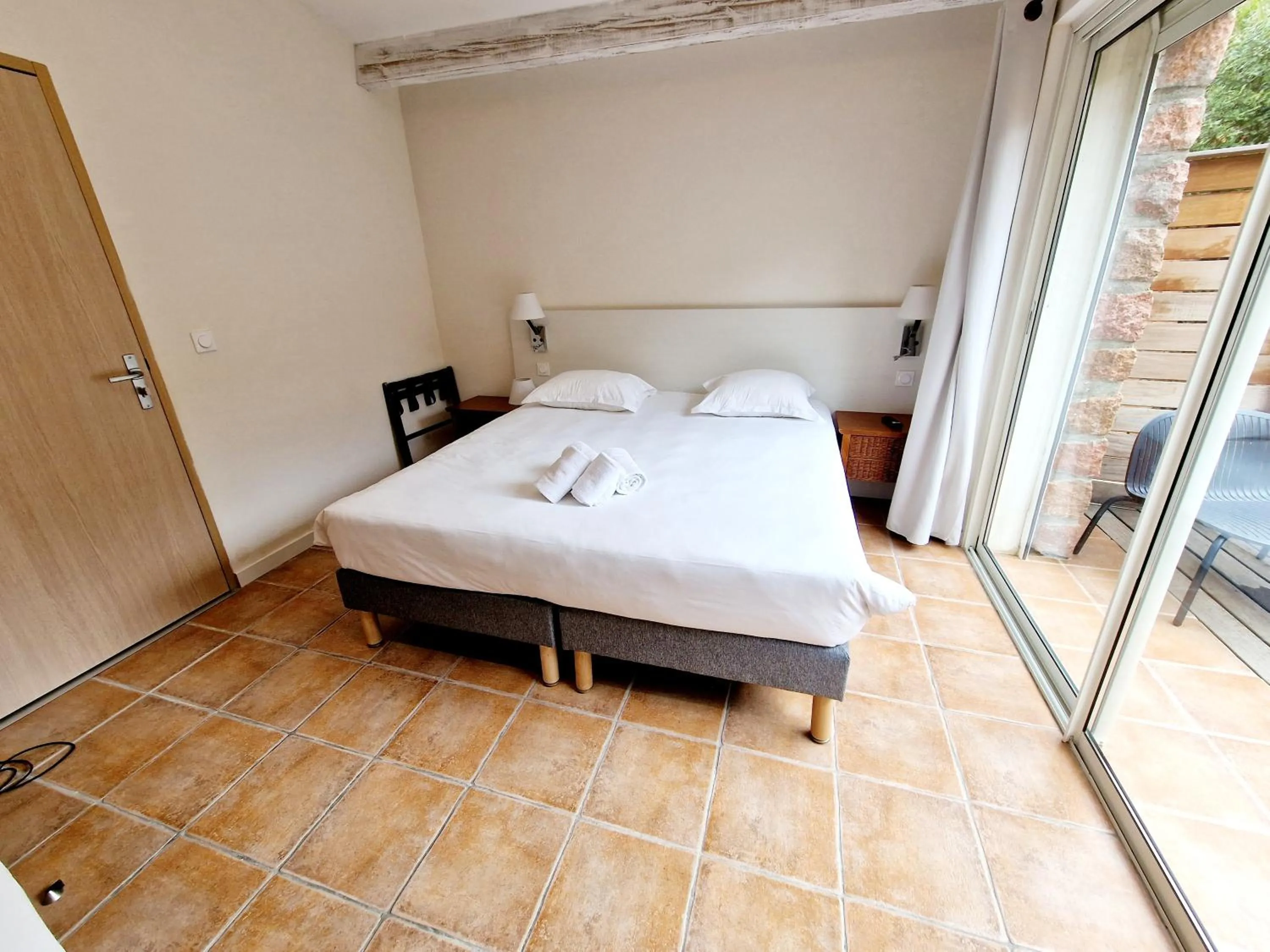 Bed in Hôtel Bella Vista