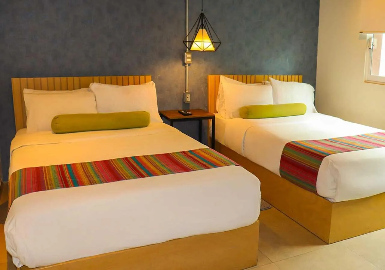 Bed in The Host Business Suites at WTC