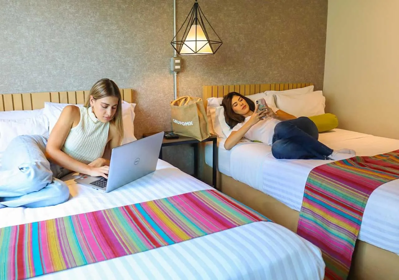 Bed in The Host Business Suites at WTC