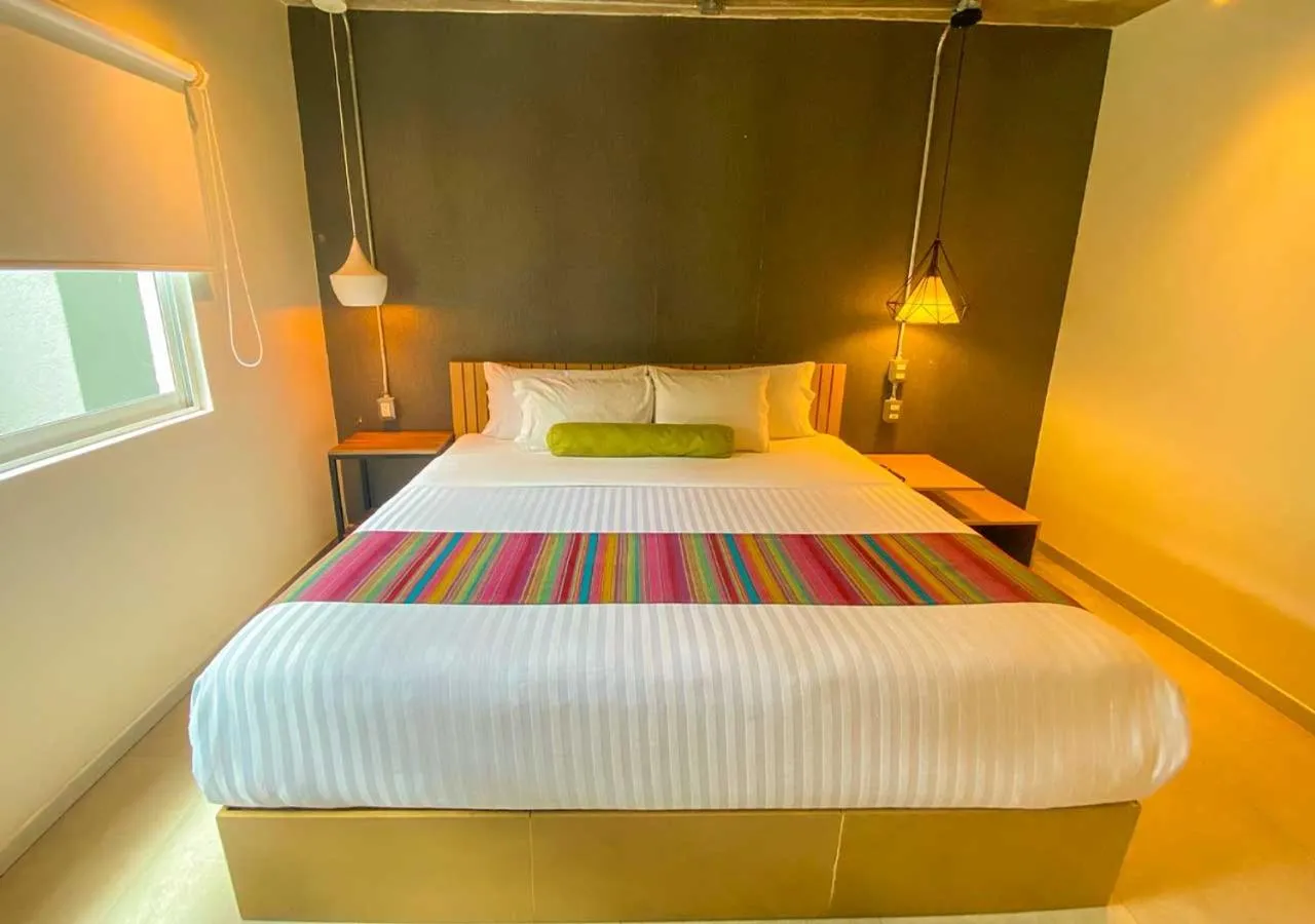 Bed in The Host Business Suites at WTC