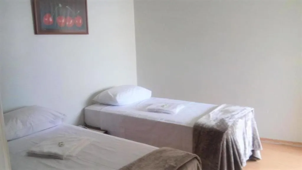 Bed in La Residence Flat Hotel