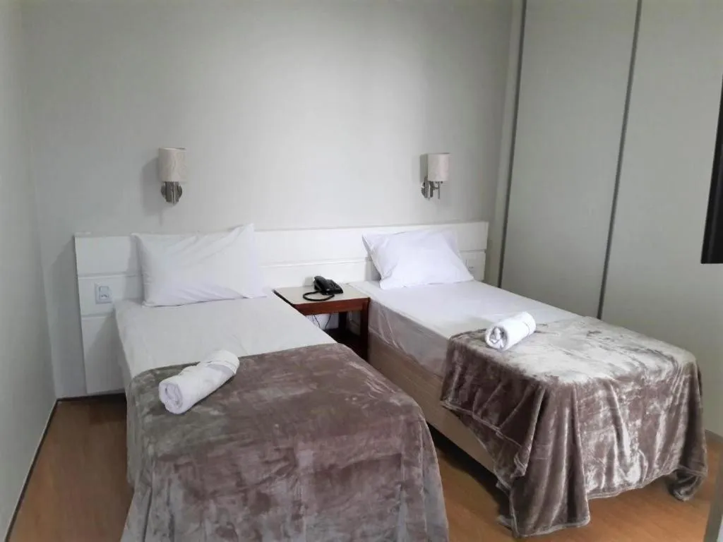 Bed in La Residence Flat Hotel