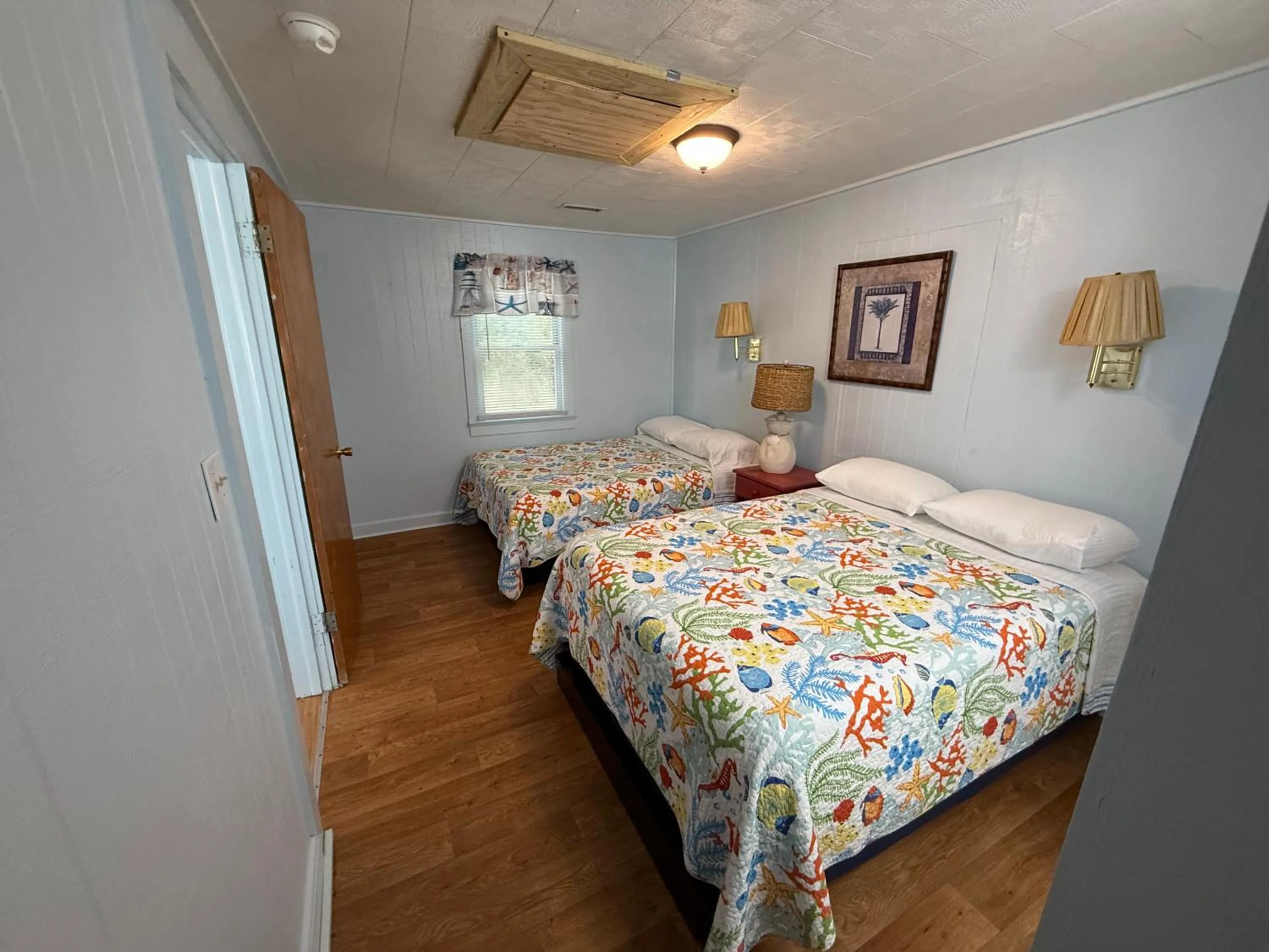 Bed in Outer Banks Motel - Village Accommodations