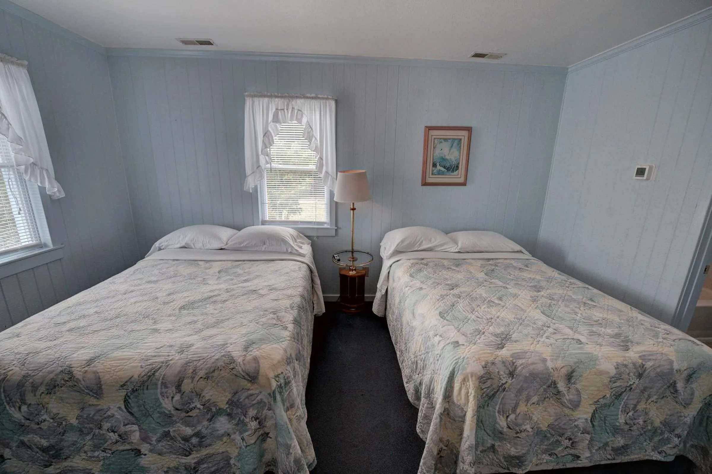 Bed in Outer Banks Motel - Village Accommodations