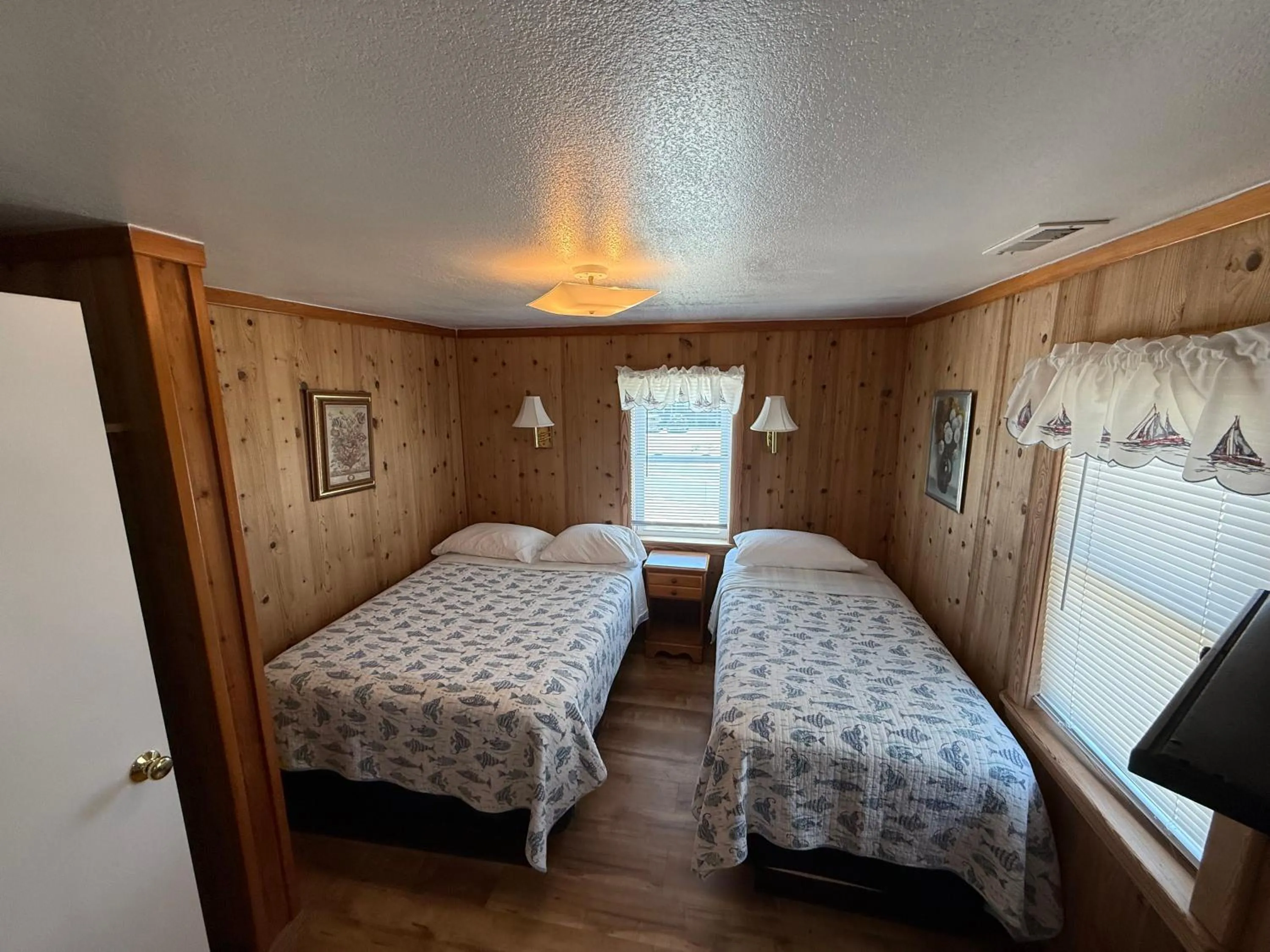 Bed in Outer Banks Motel - Village Accommodations