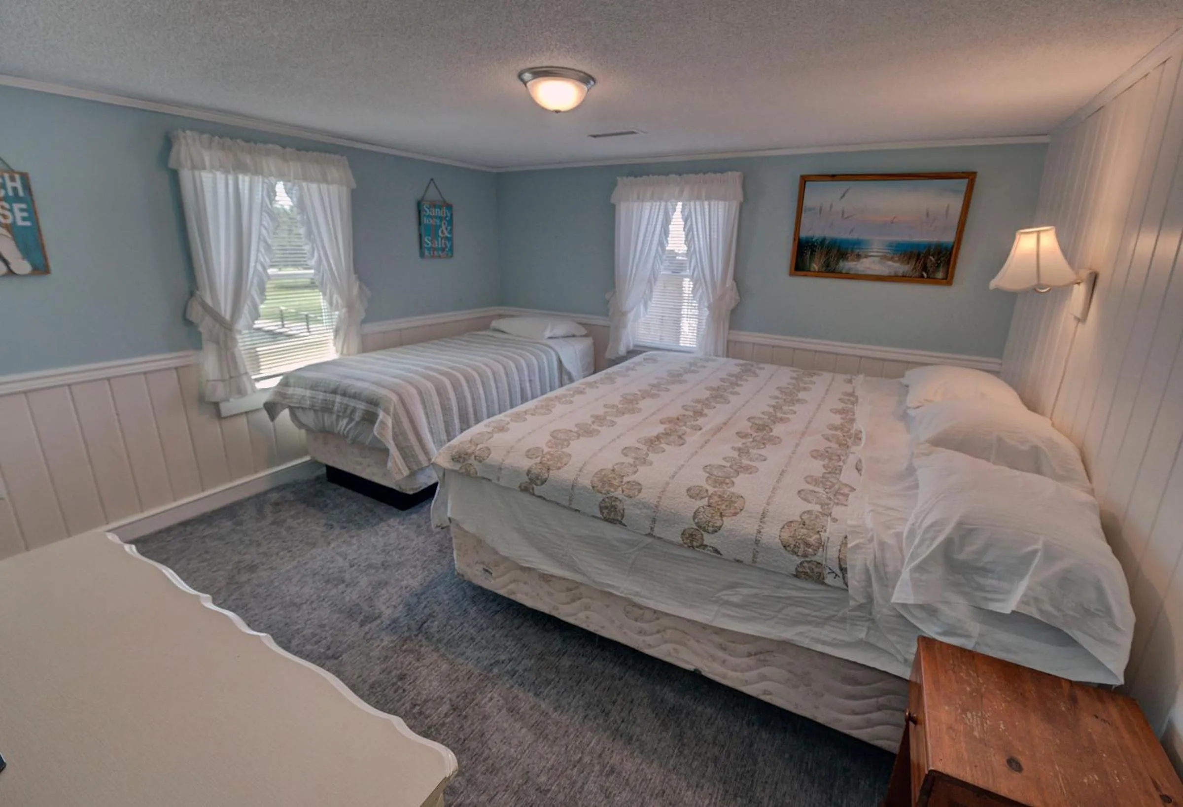 Bed in Outer Banks Motel - Village Accommodations