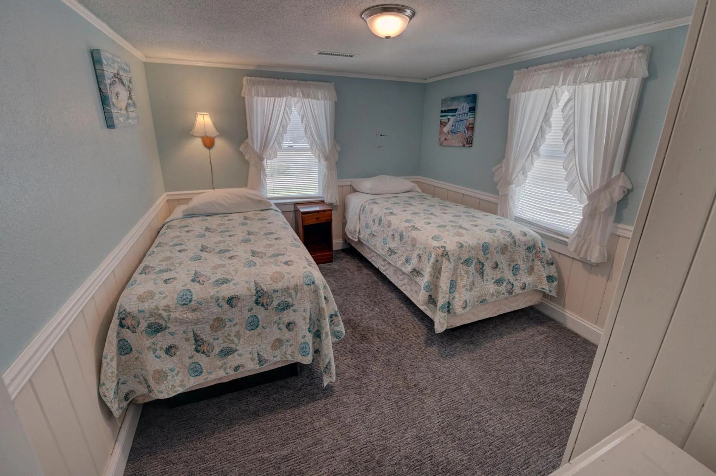 Bed in Outer Banks Motel - Village Accommodations