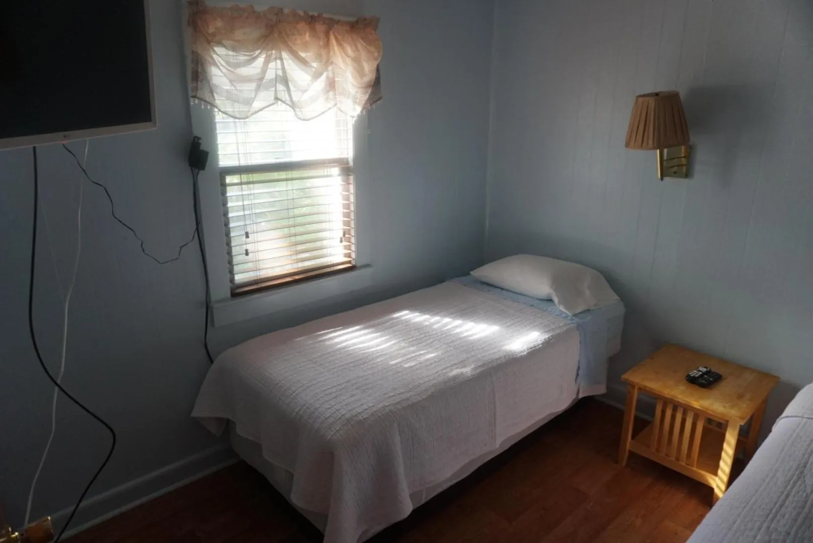 Bed in Outer Banks Motel - Village Accommodations