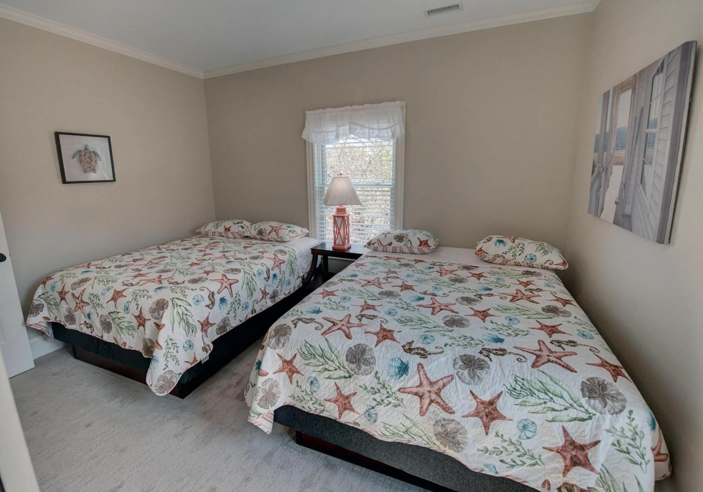 Bed in Outer Banks Motel - Village Accommodations