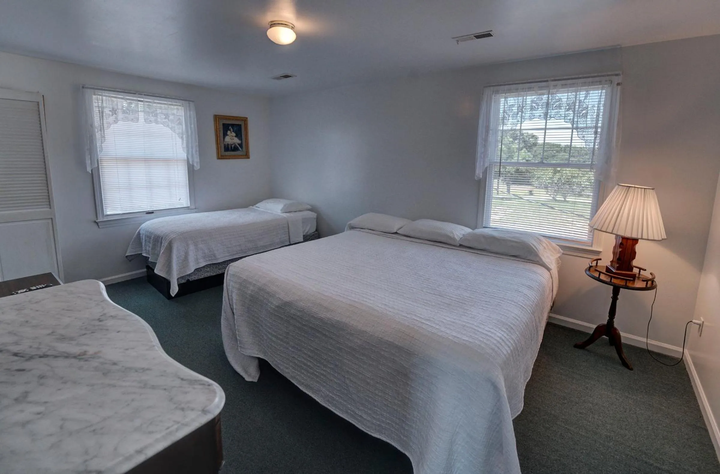 Bed in Outer Banks Motel - Village Accommodations