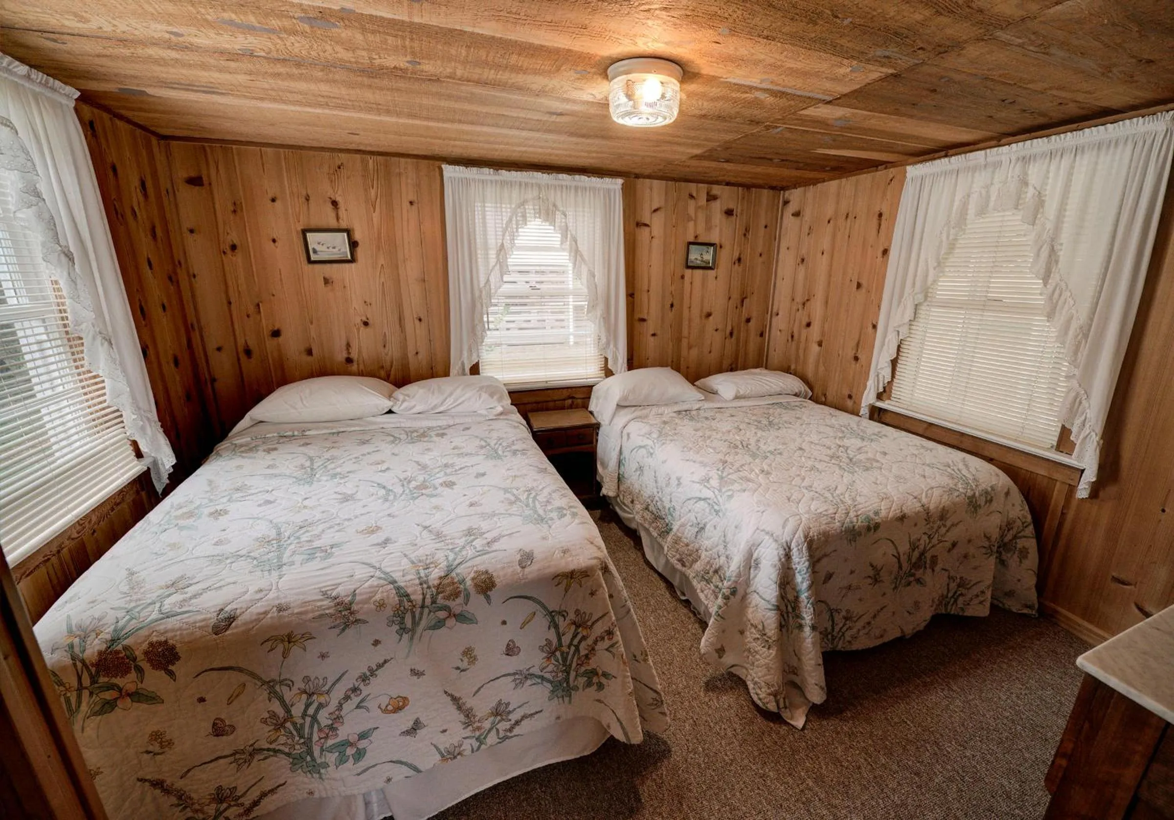 Bed in Outer Banks Motel - Village Accommodations