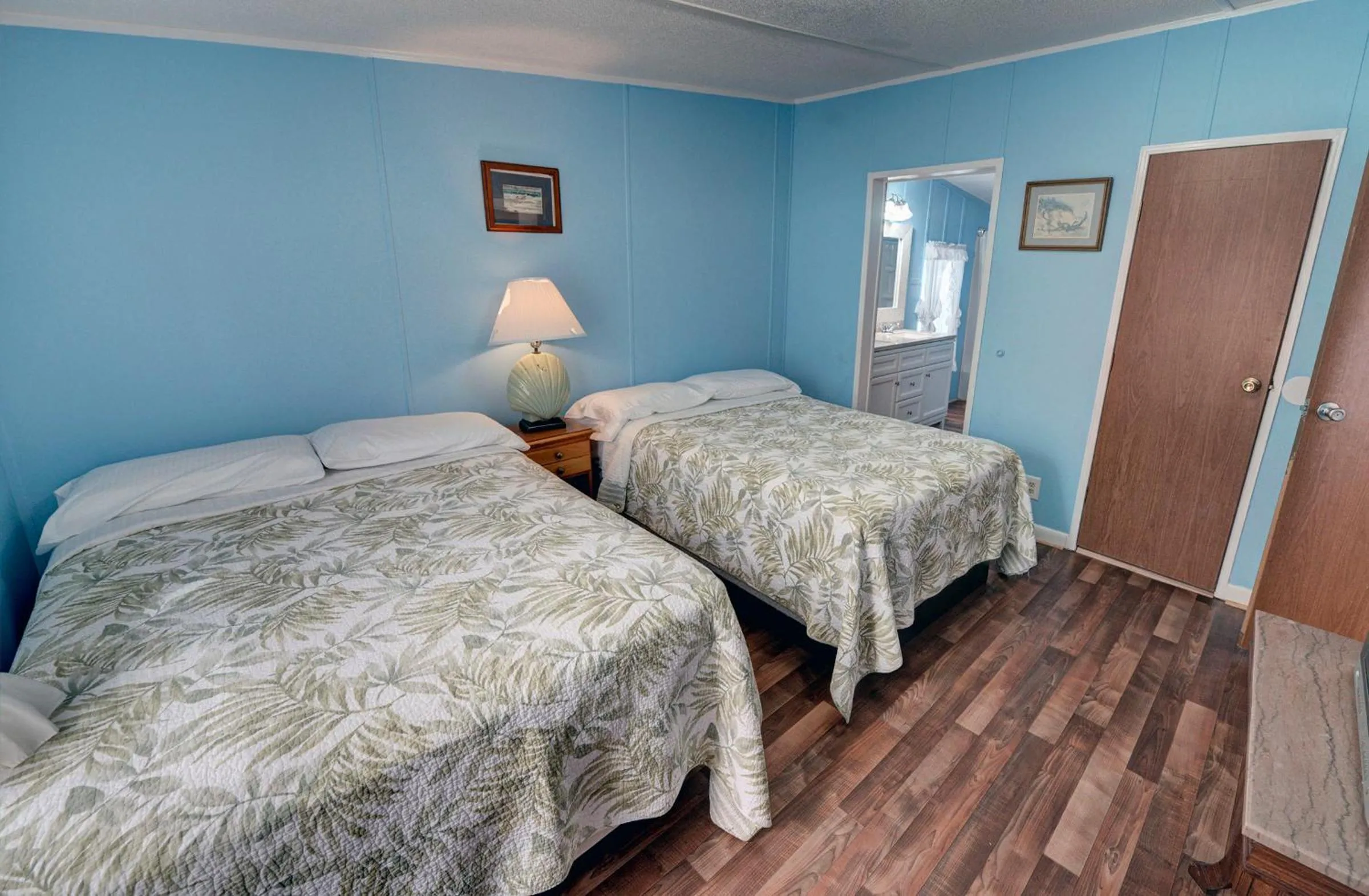 Bed in Outer Banks Motel - Village Accommodations