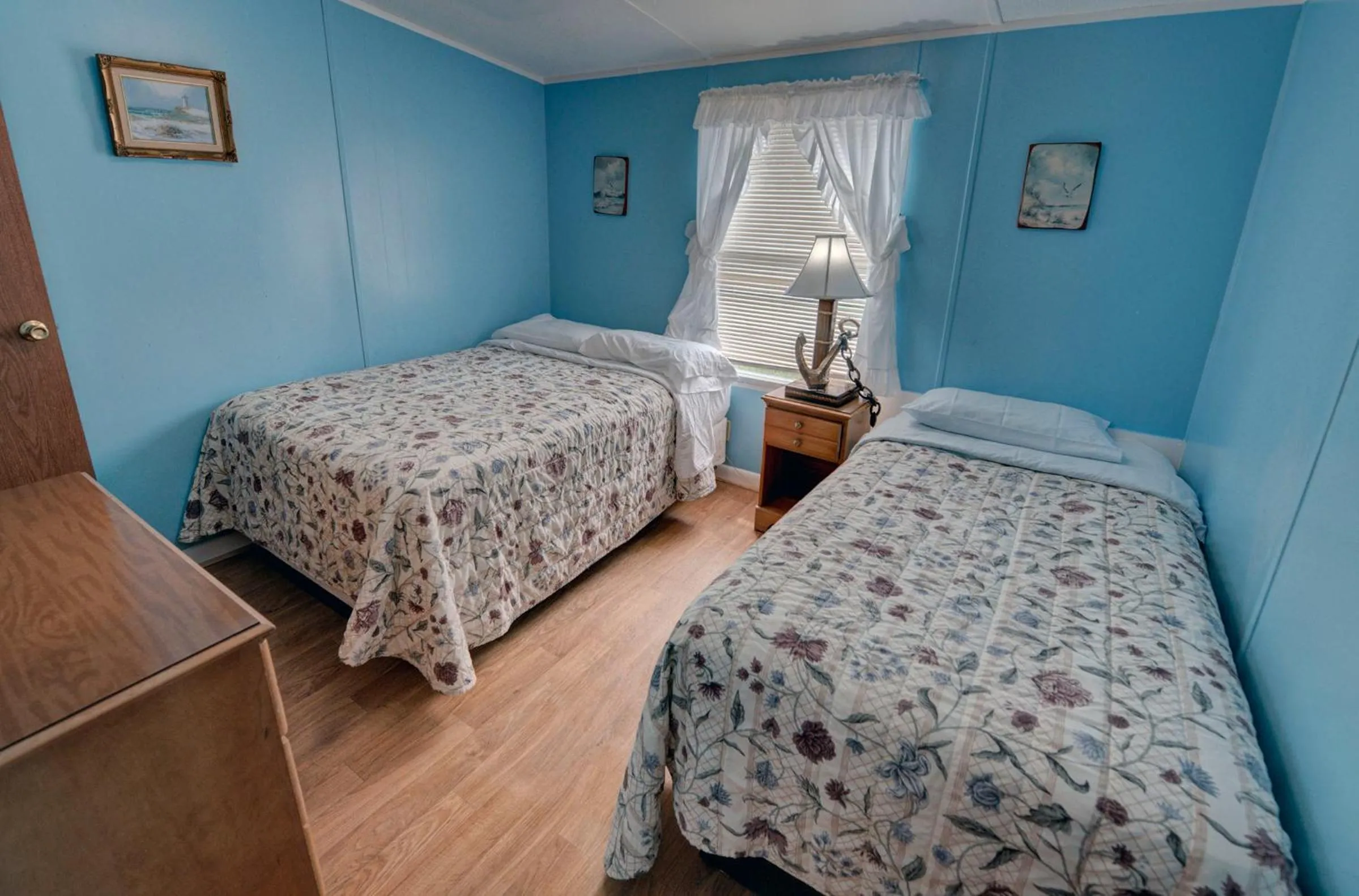 Bed in Outer Banks Motel - Village Accommodations