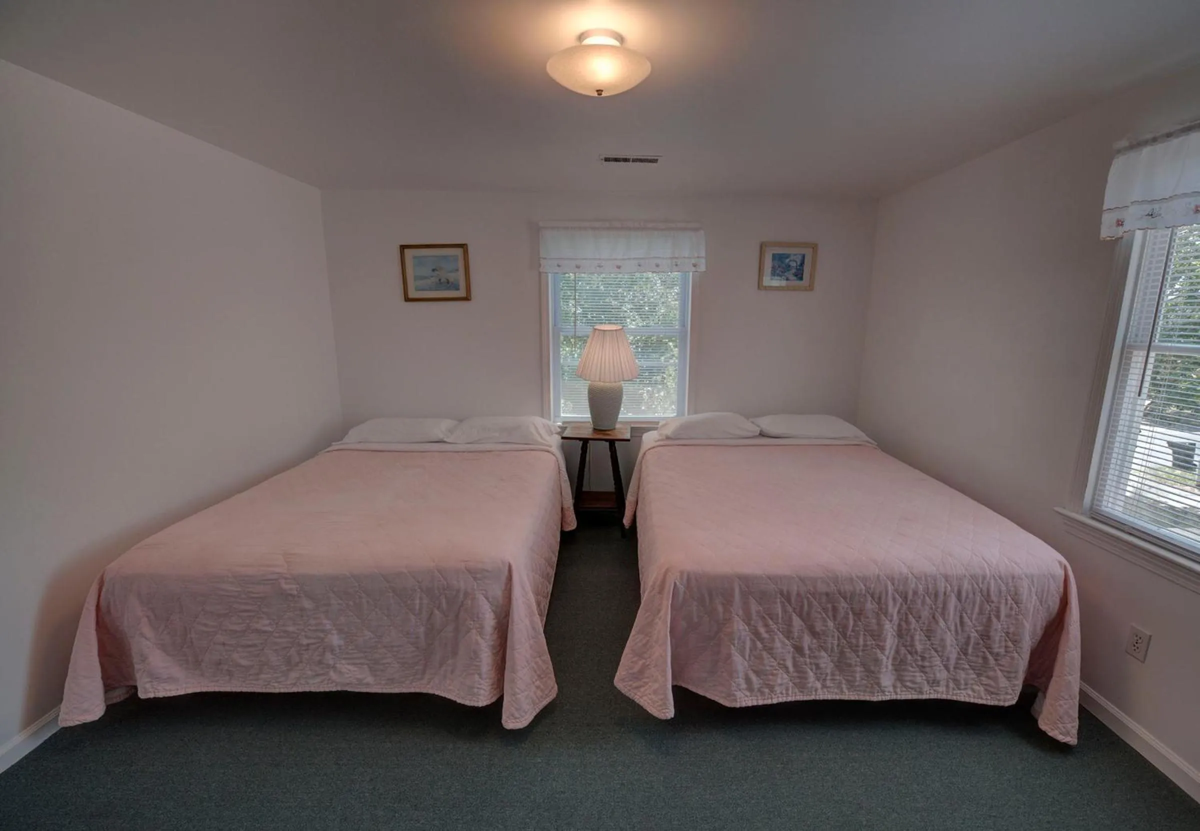 Bed in Outer Banks Motel - Village Accommodations