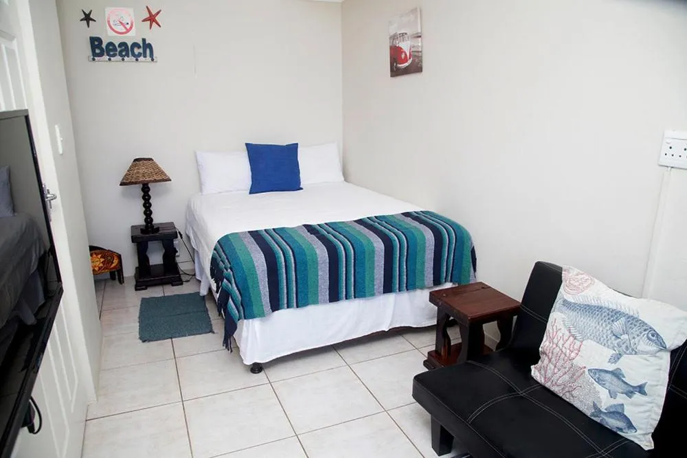 Bed in Ansteys Beach Self Catering Apartments