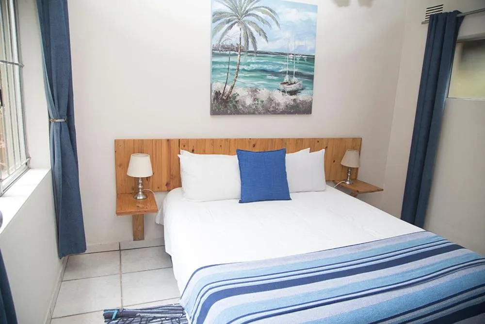 Bed in Ansteys Beach Self Catering Apartments
