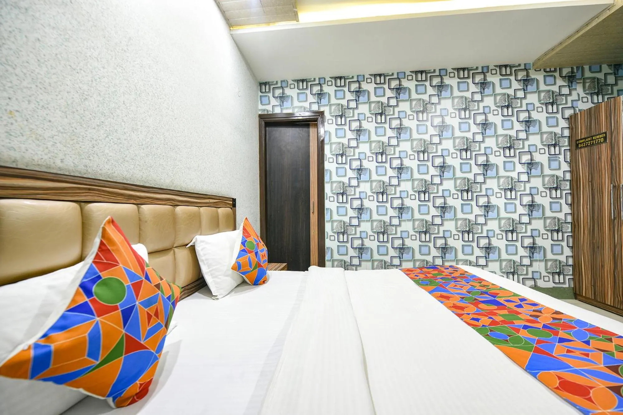 Bed in FabHotel Ess Pee Grand