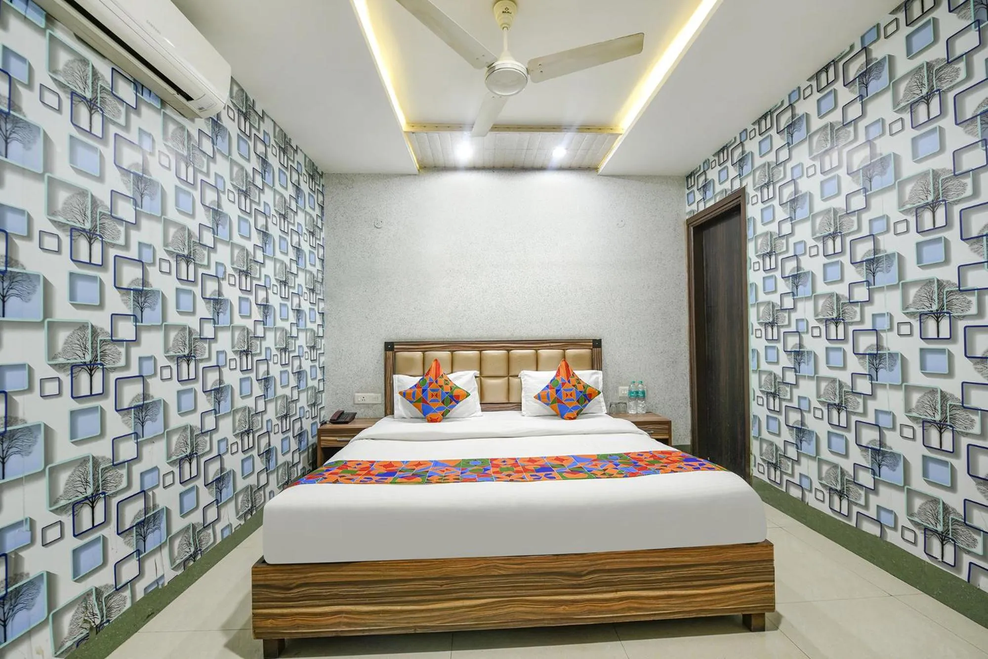 Bed in FabHotel Ess Pee Grand