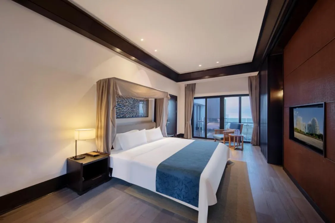 Bed in Howard Johnson Sandalwoods Resort Huizhou