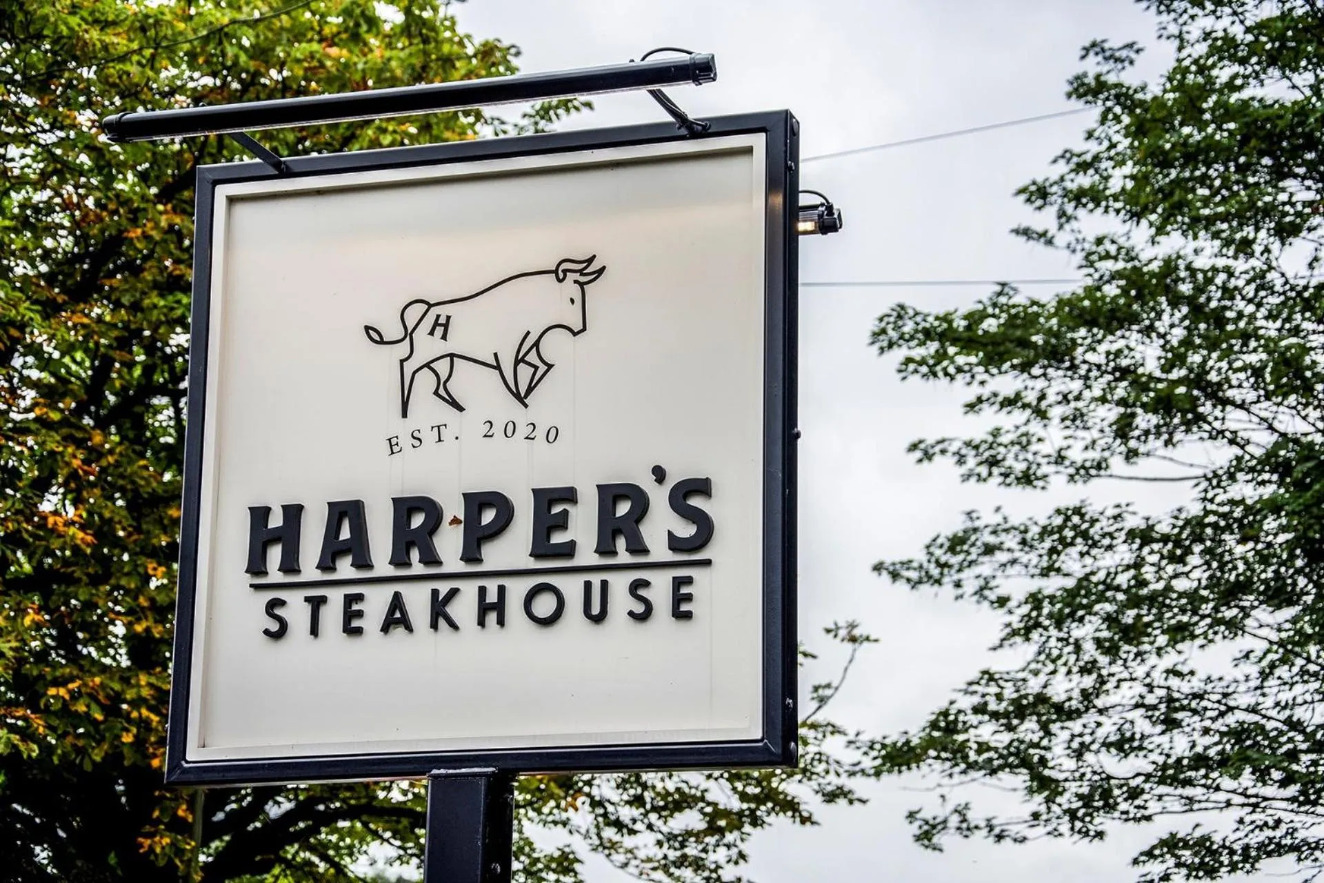 Property logo or sign in Harper's Steakhouse with Rooms, Haslemere