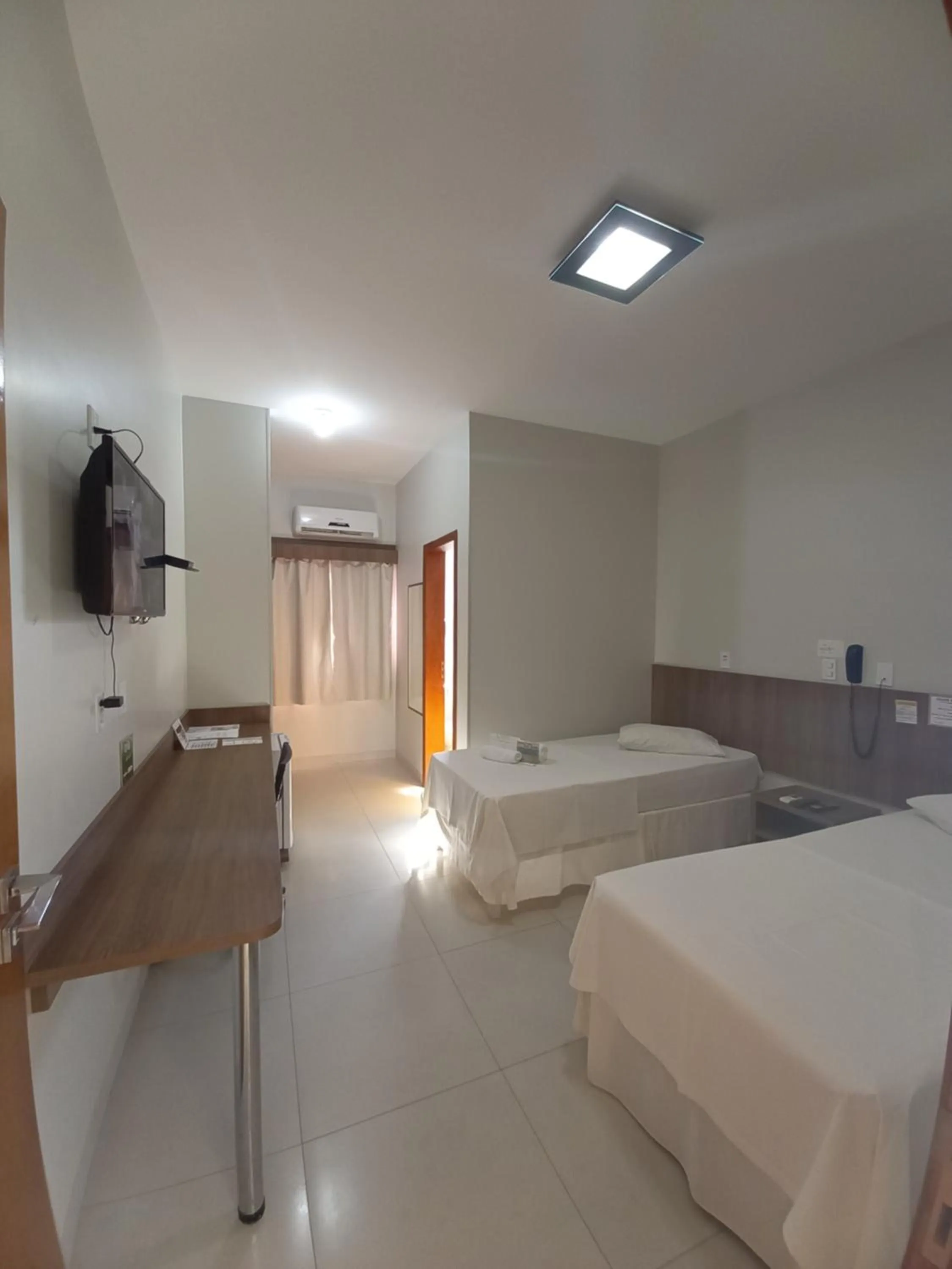 Bed in Hotel Mandino