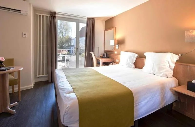 Bed in Flanders Hotel