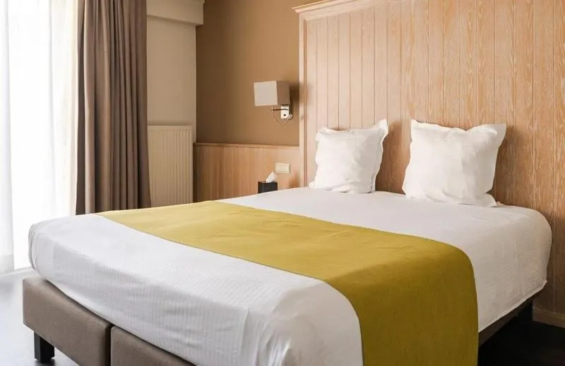 Bed in Flanders Hotel