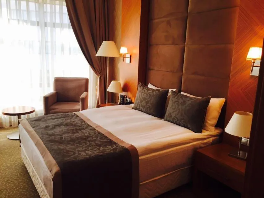 Bed in Vivaldi Park Hotel
