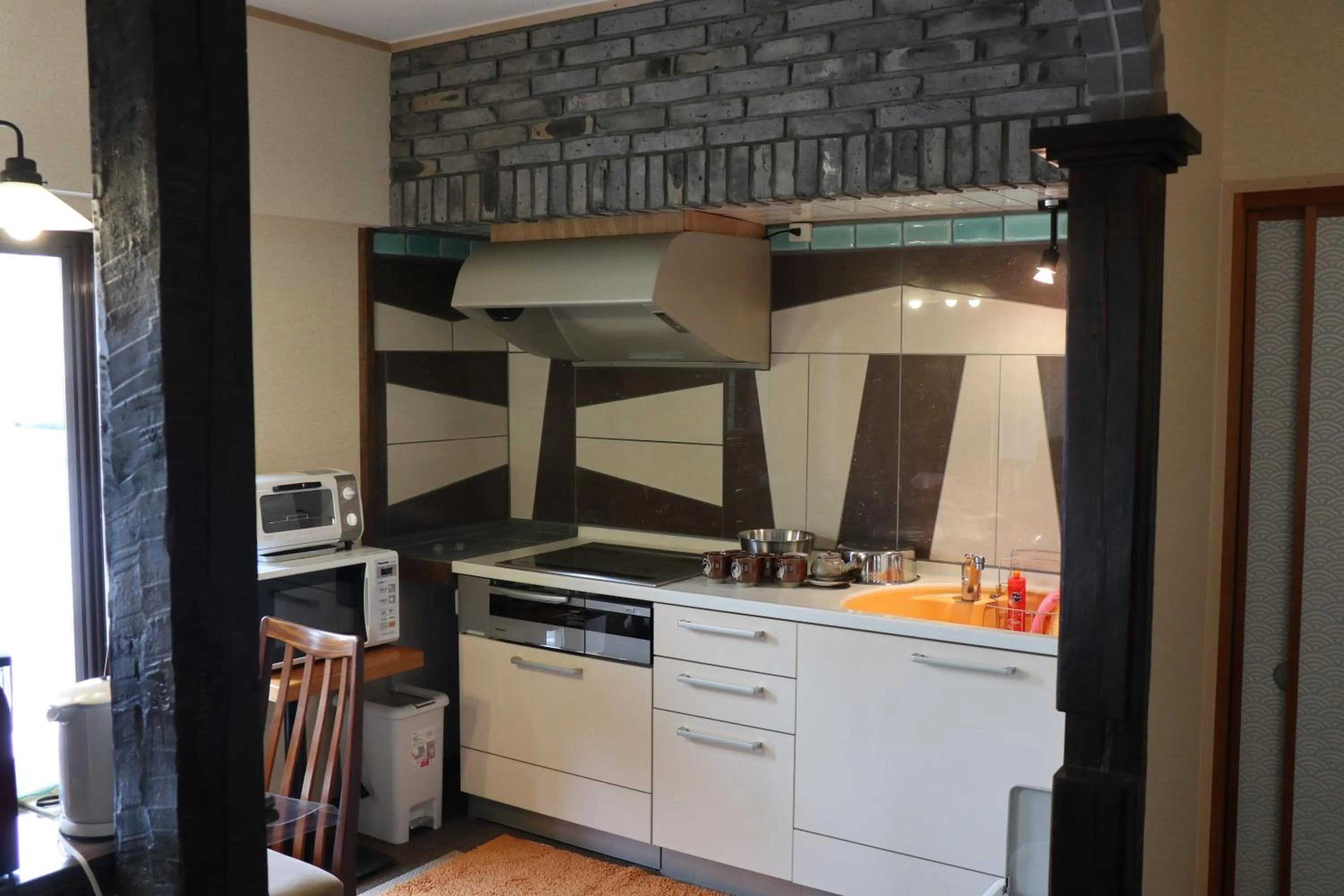 Kitchen or kitchenette in Guest House Dohei