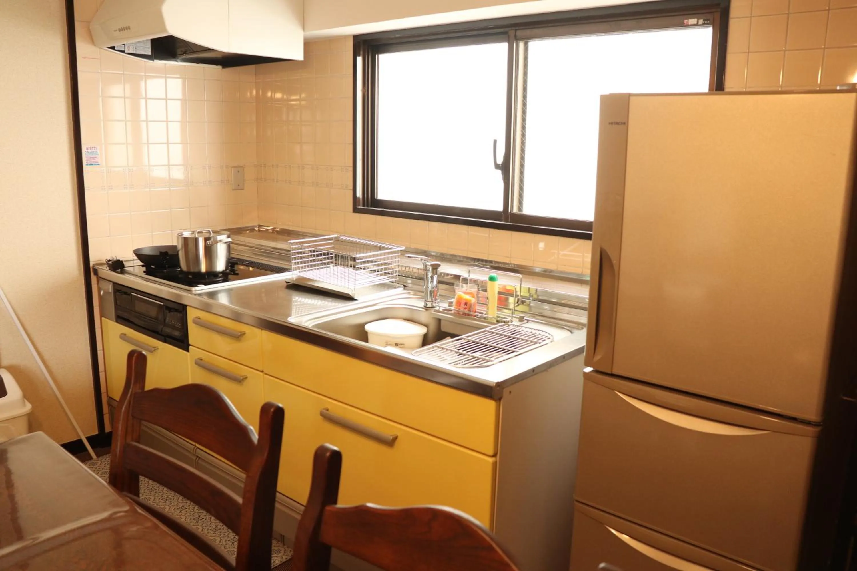 Kitchen or kitchenette in Guest House Dohei