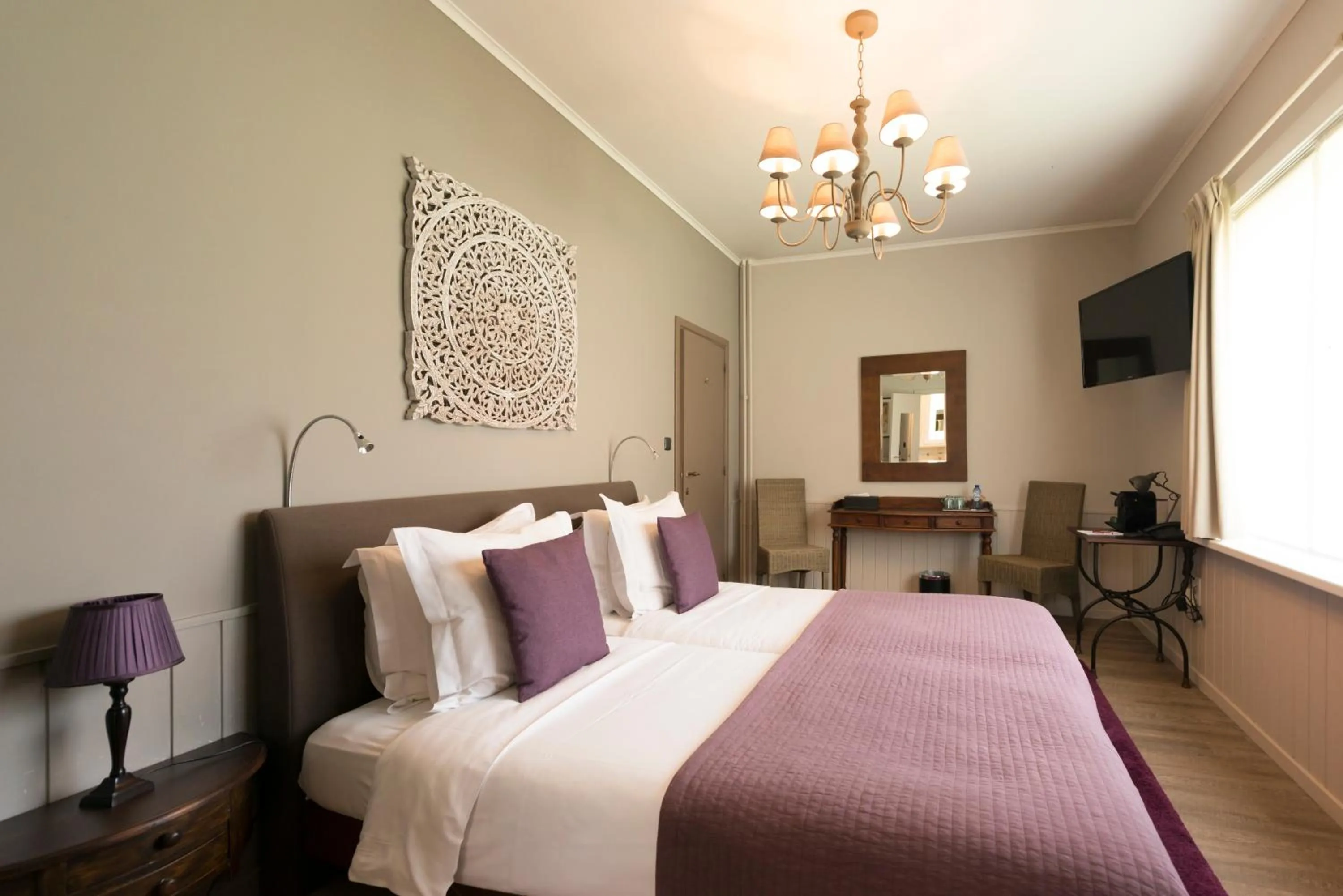 Bed in Charmehotel Klokkenhof